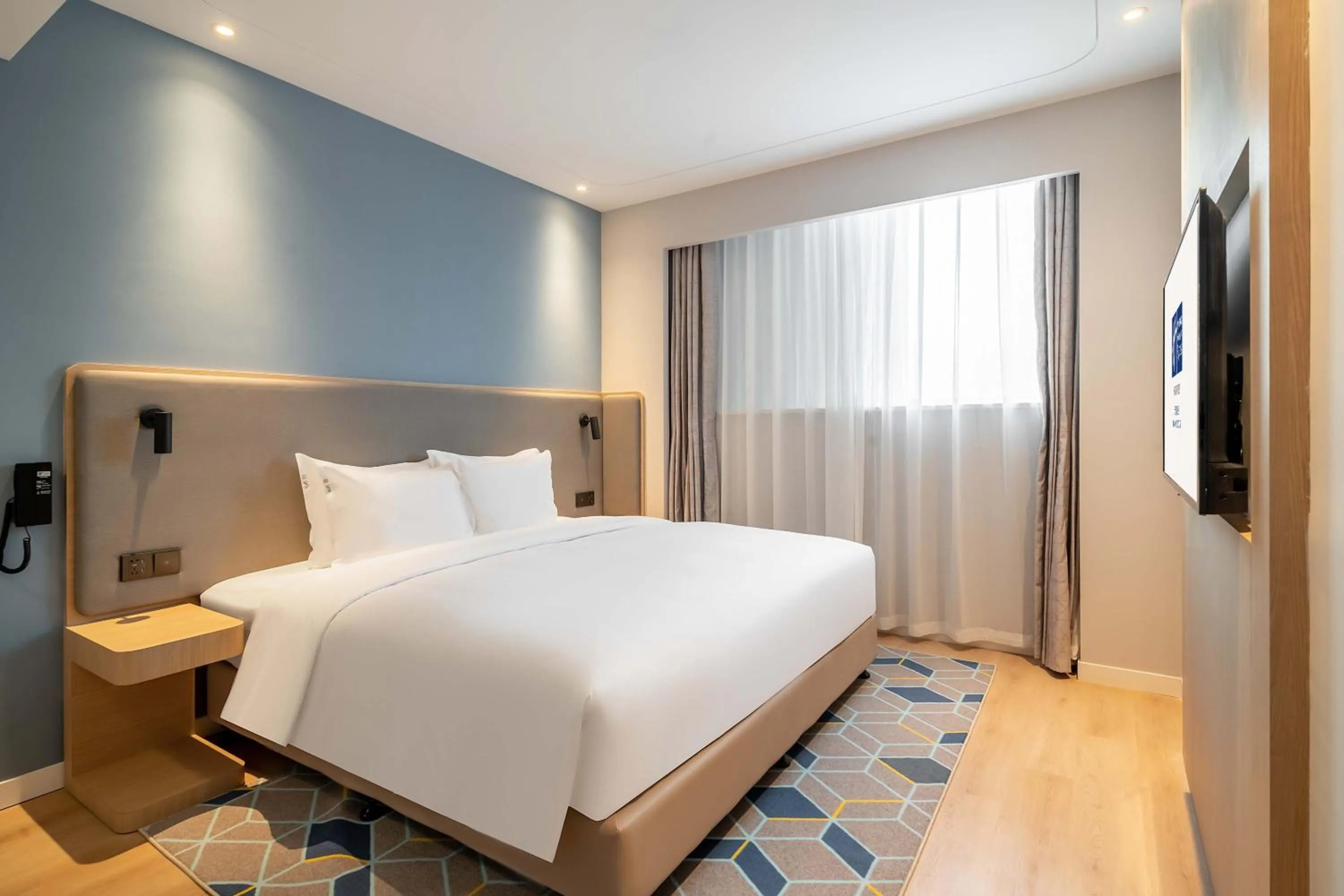 Bed in Holiday Inn Express Jinan Airport Zone by IHG