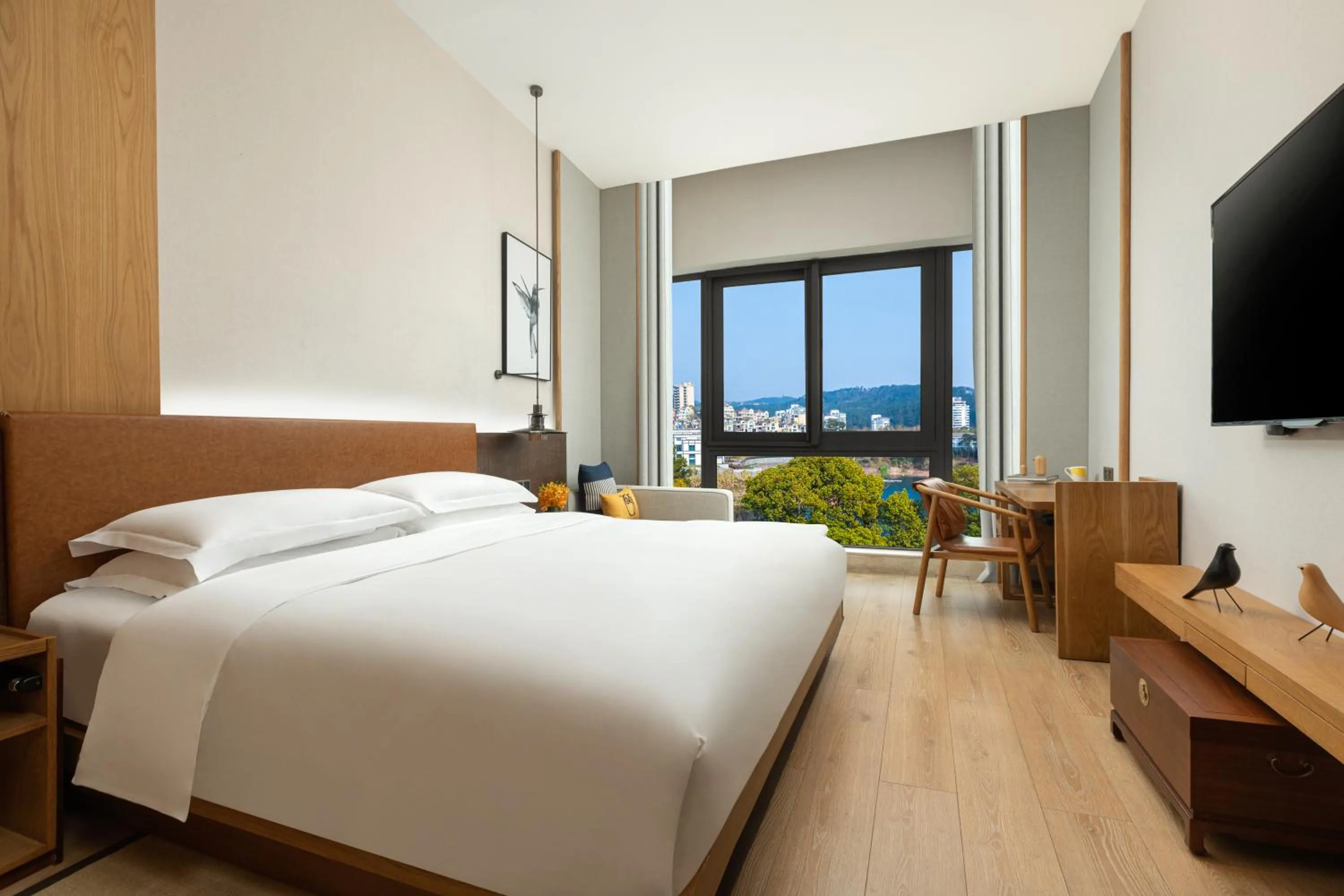 Photo of the whole room, Bed in voco Thousand Island Lake by IHG