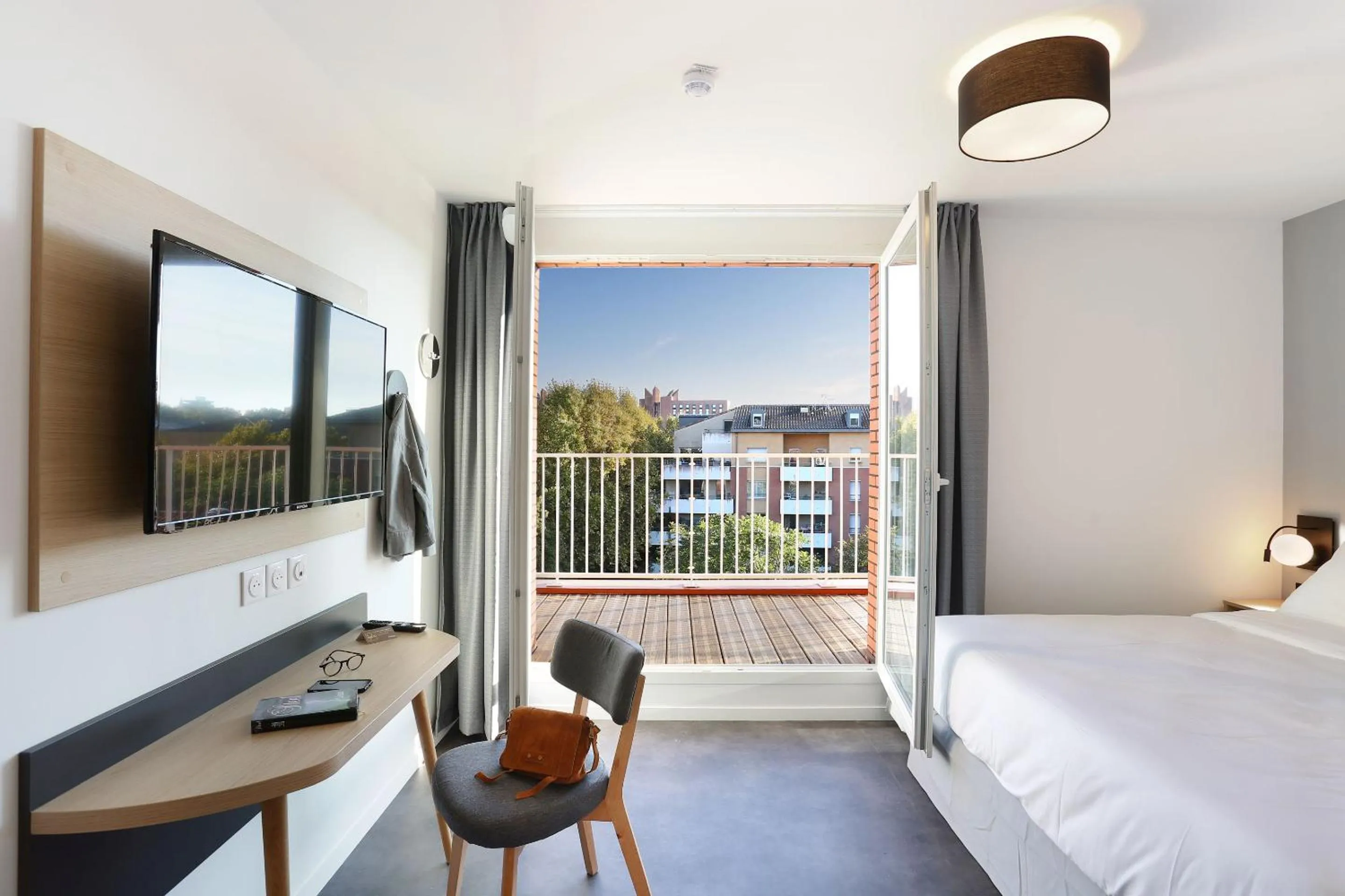 Bedroom, Bed in Appart Hotel Odalys City Toulouse Centre Compans Caffarelli