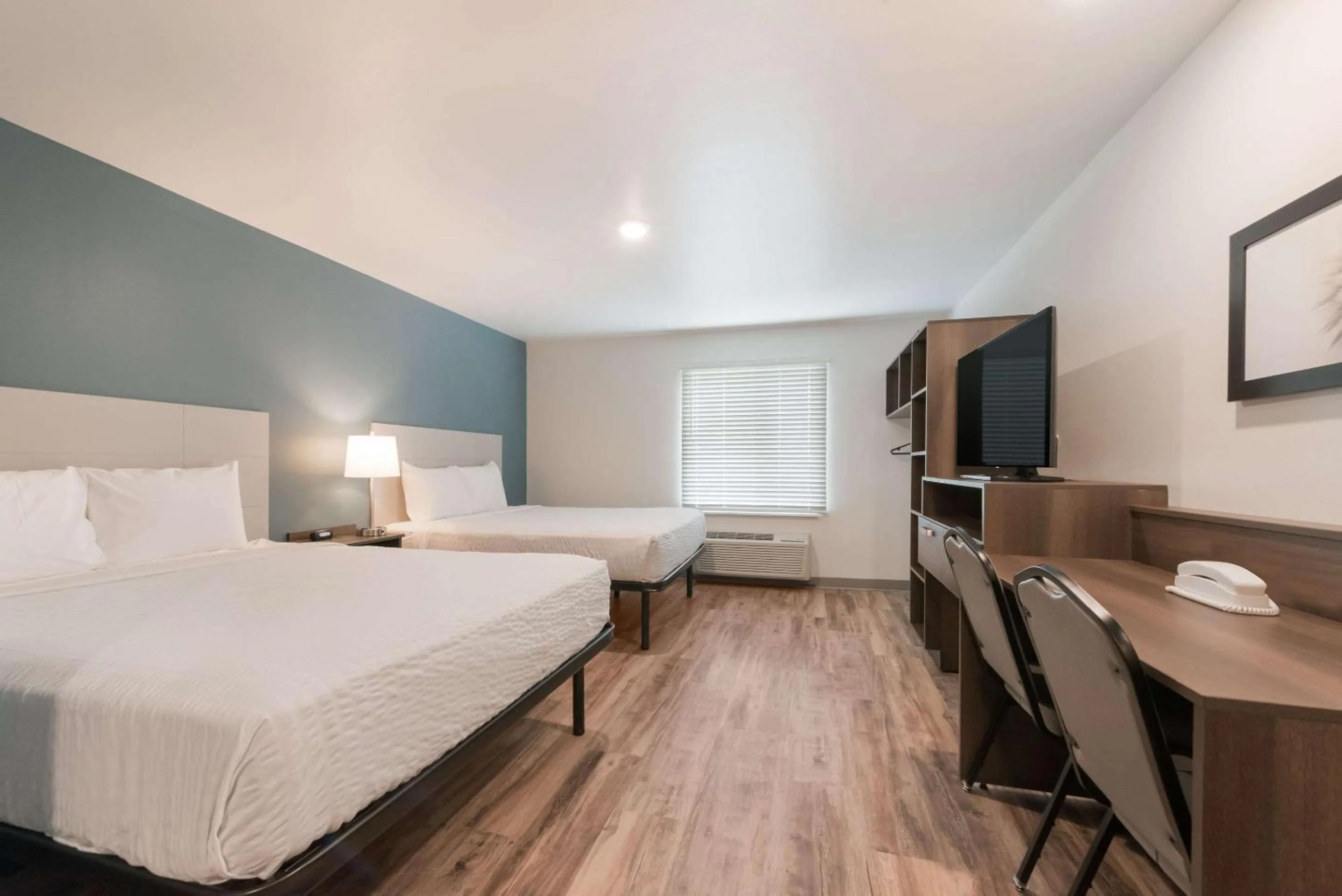 Bedroom, Bed in WoodSpring Suites Philadelphia Northeast