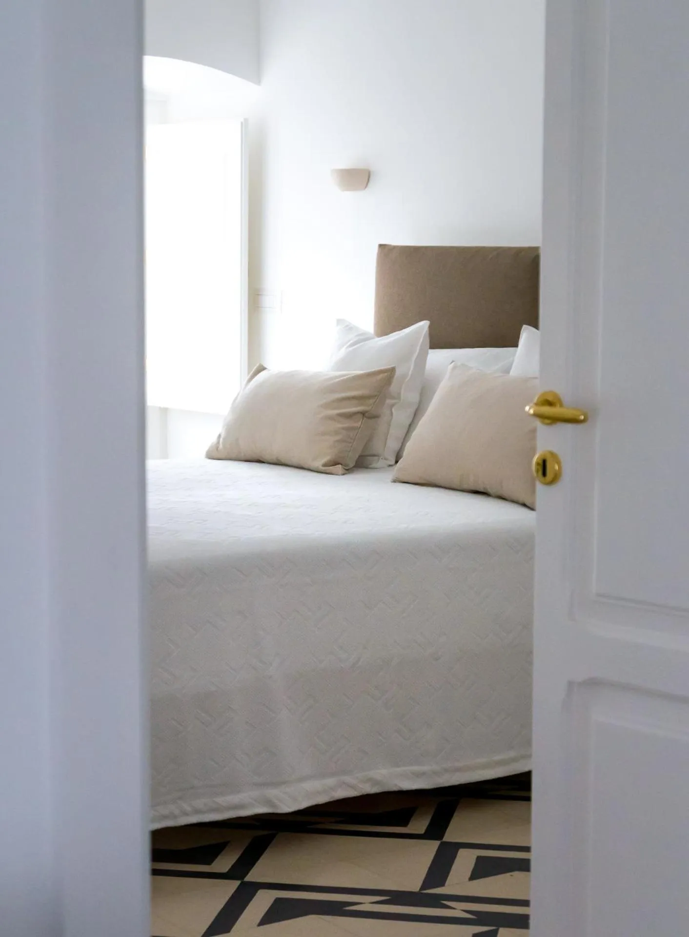 Bed in Villa Aurelia Suites and Apartments