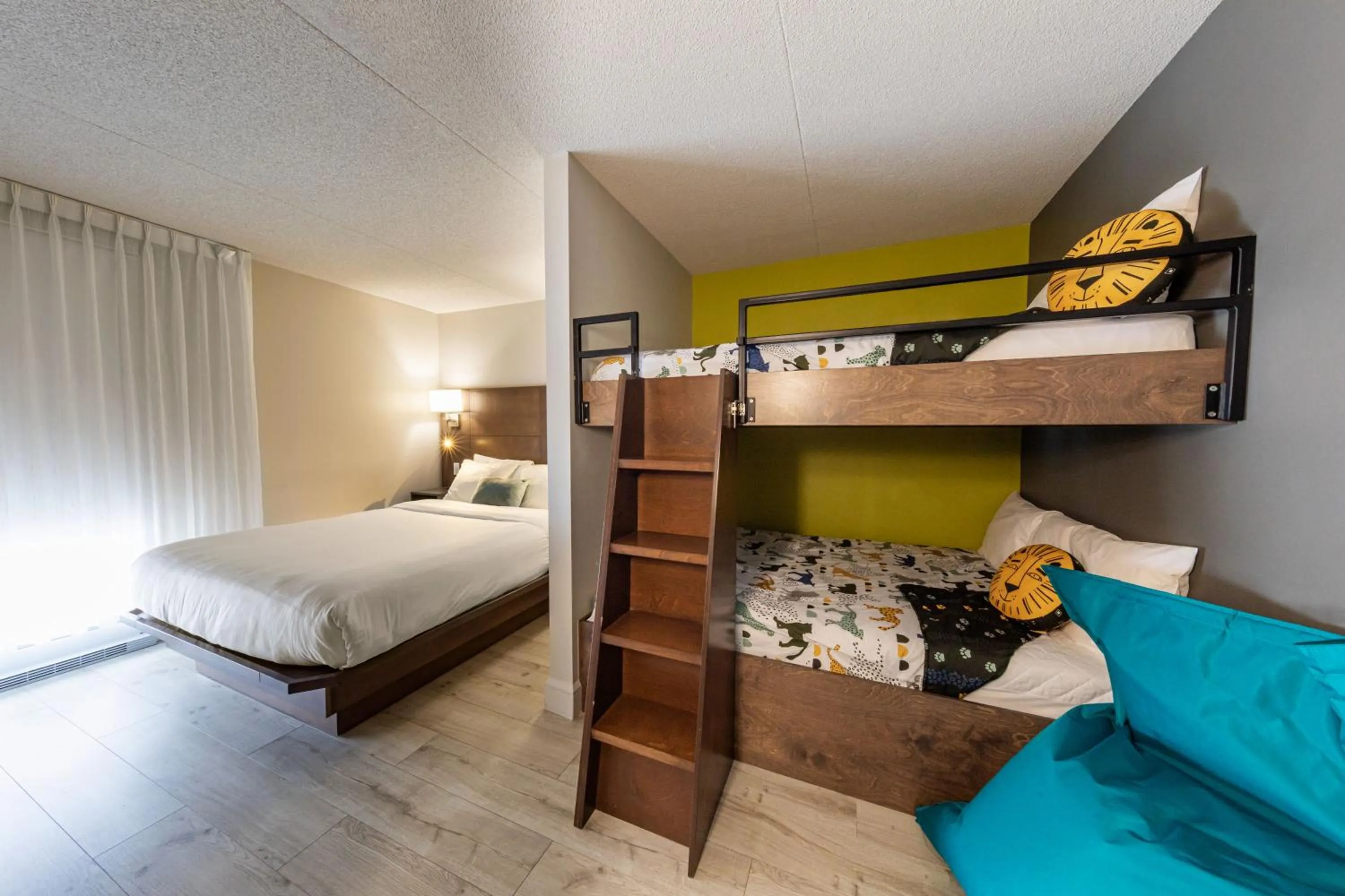 Bed in Hôtel & Suites Normandin Québec