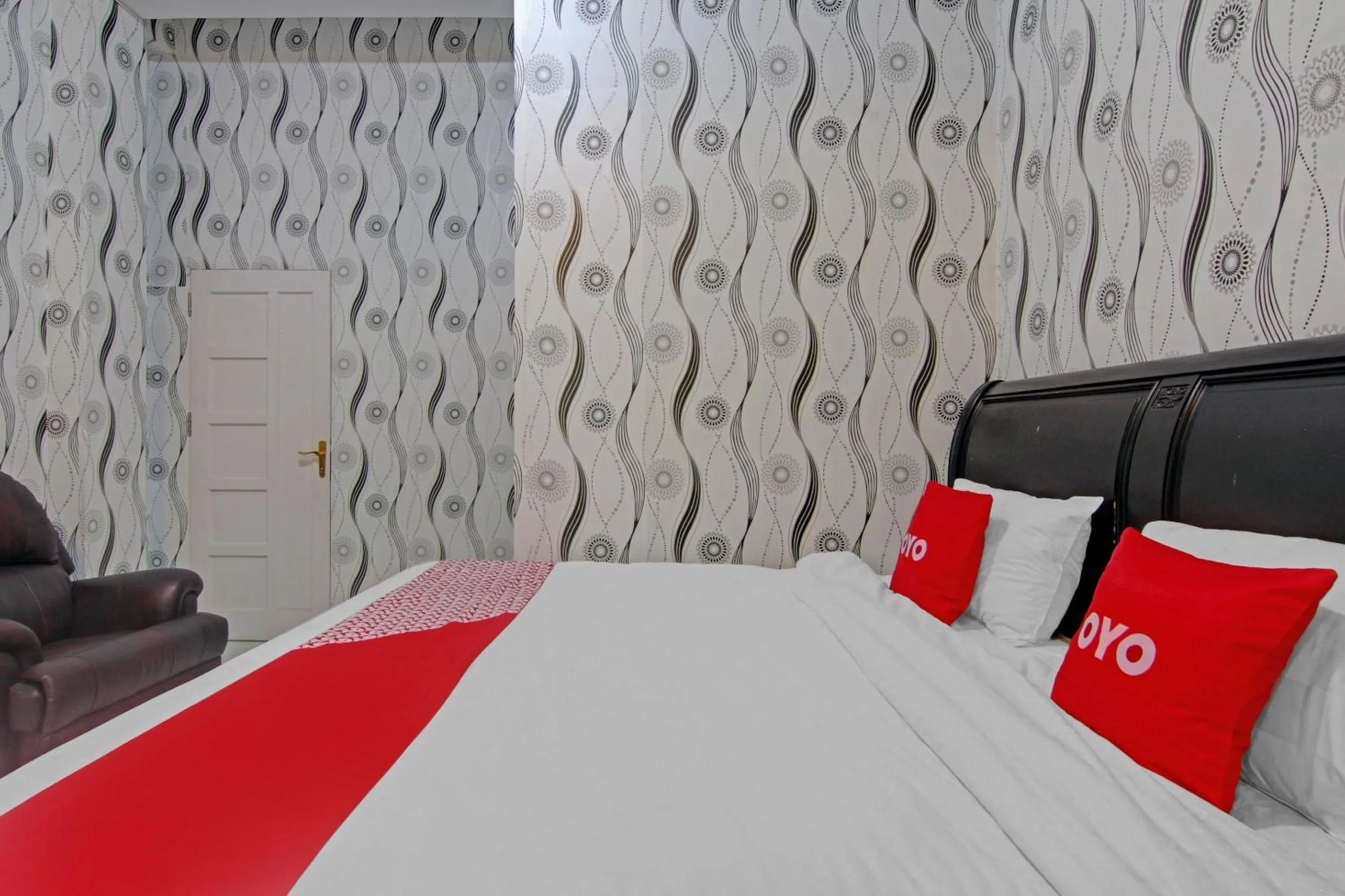 Bedroom in OYO 90615 Jojo Homestay