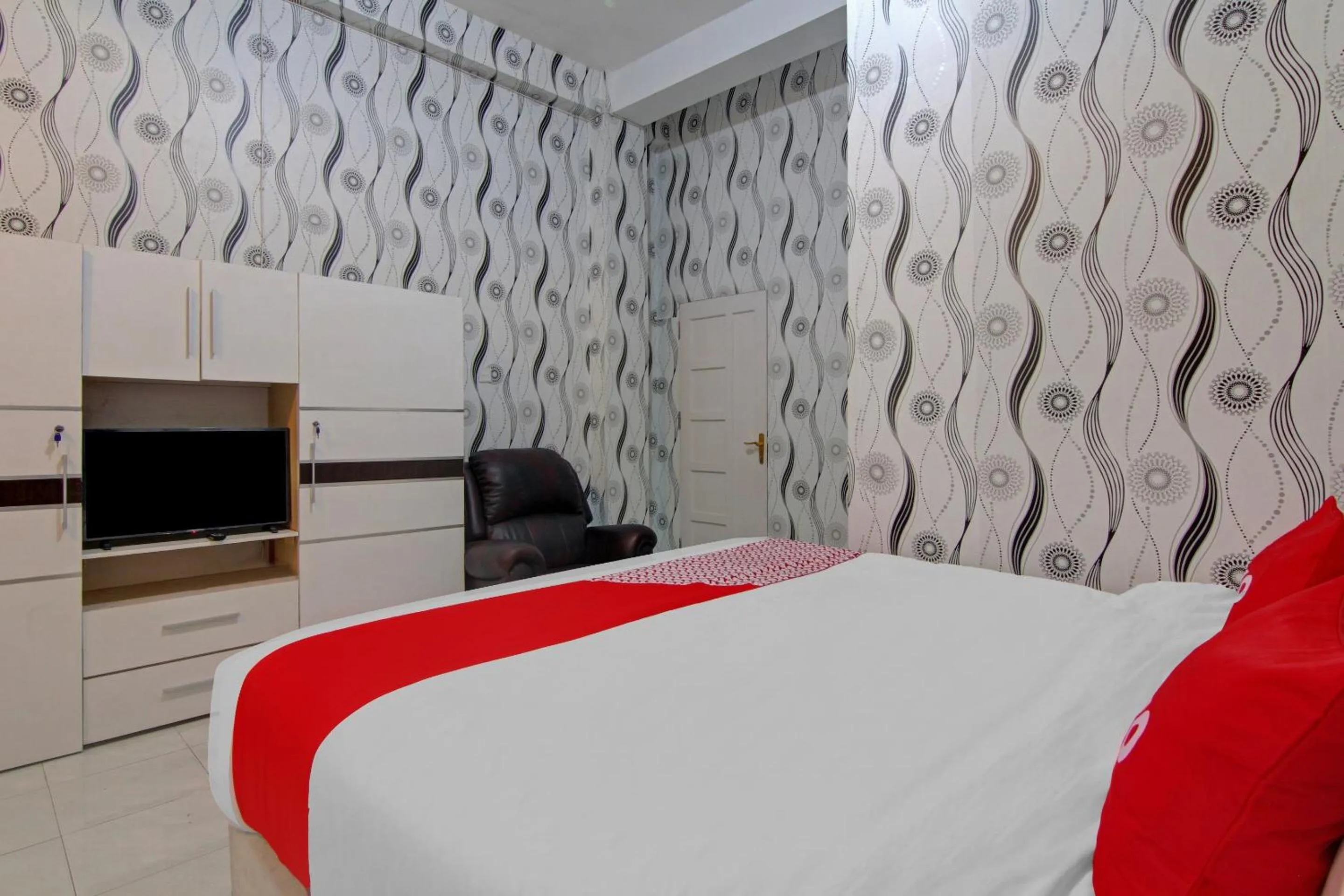 Bedroom in OYO 90615 Jojo Homestay