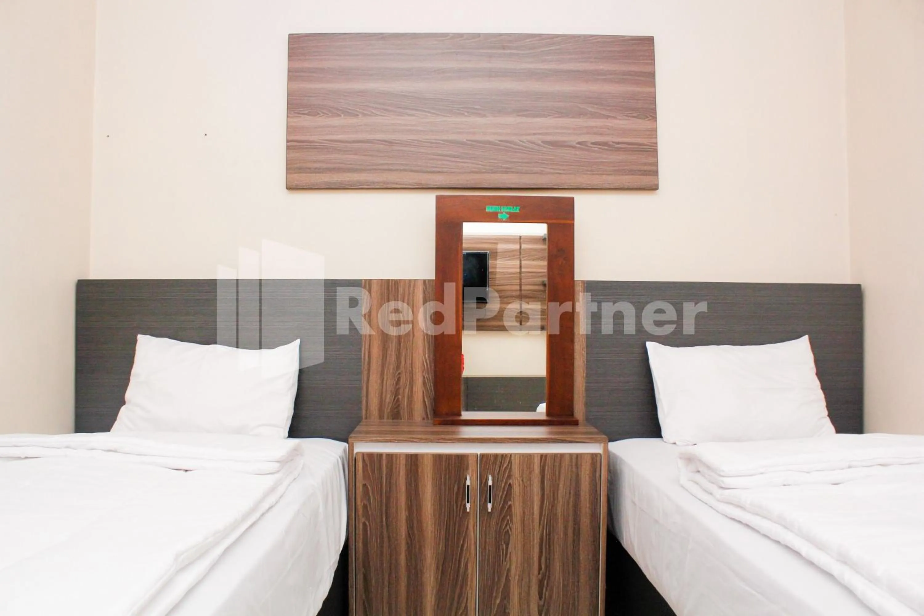 Bed in Hotel Baby Angel Dieng Mitra RedDoorz