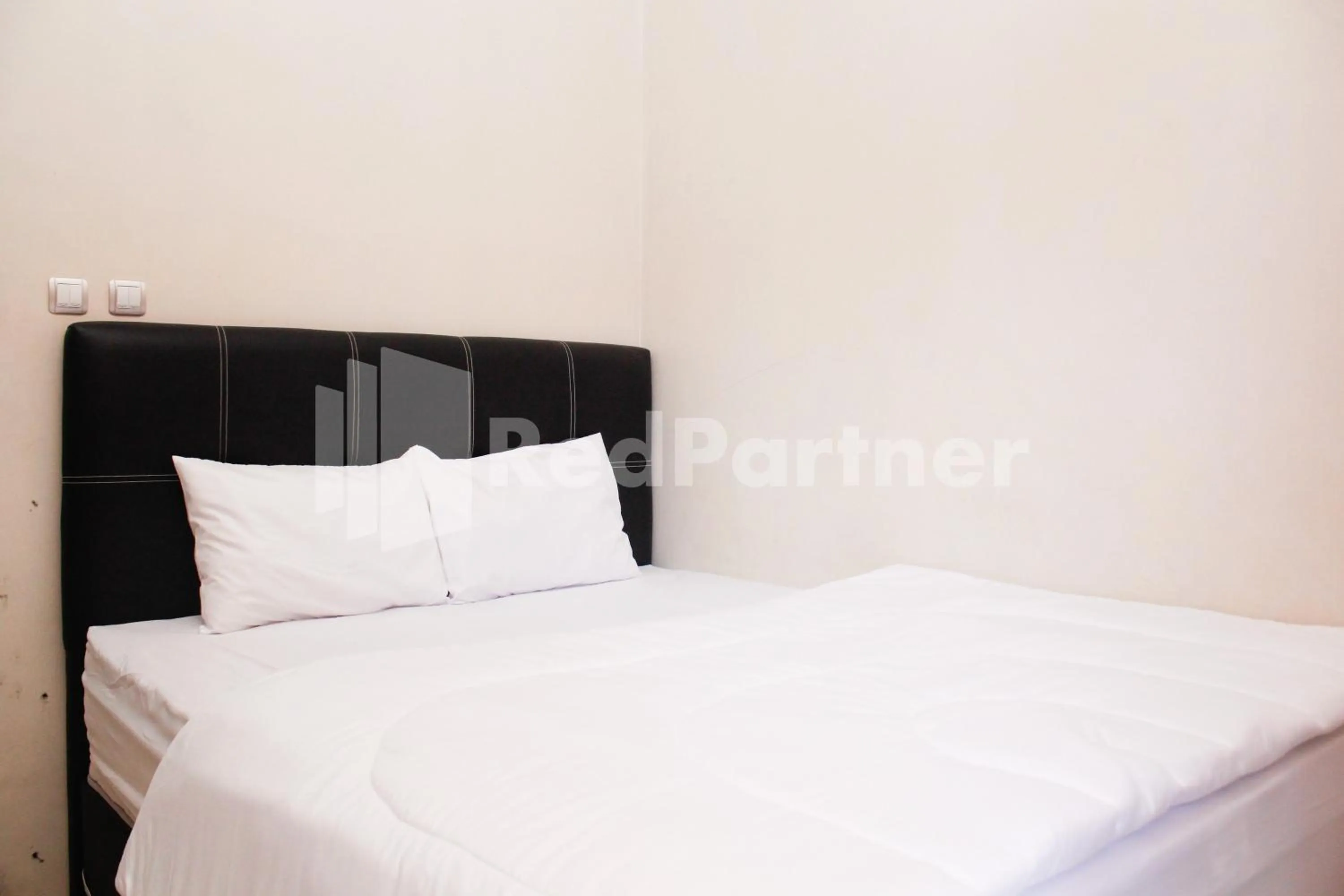 Bed in Hotel Baby Angel Dieng Mitra RedDoorz