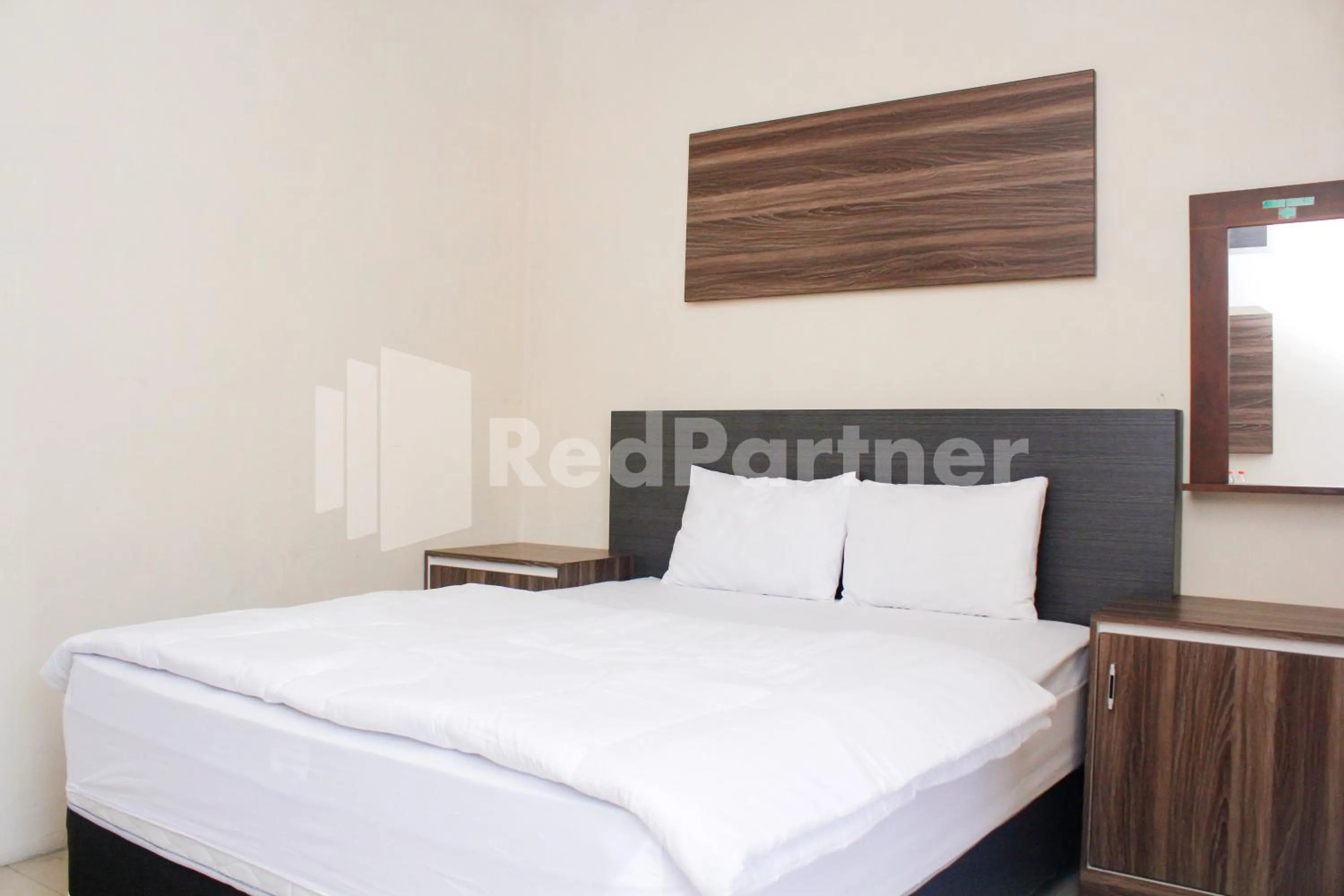 Bed in Hotel Baby Angel Dieng Mitra RedDoorz