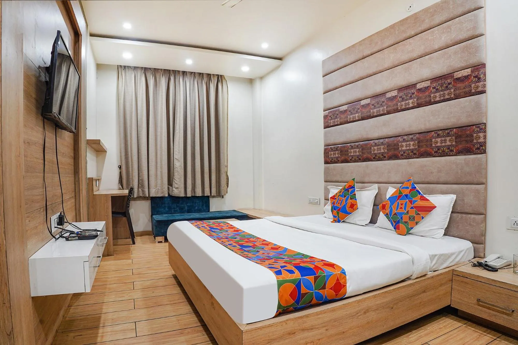 Bed in FabHotel Prime OM Palace