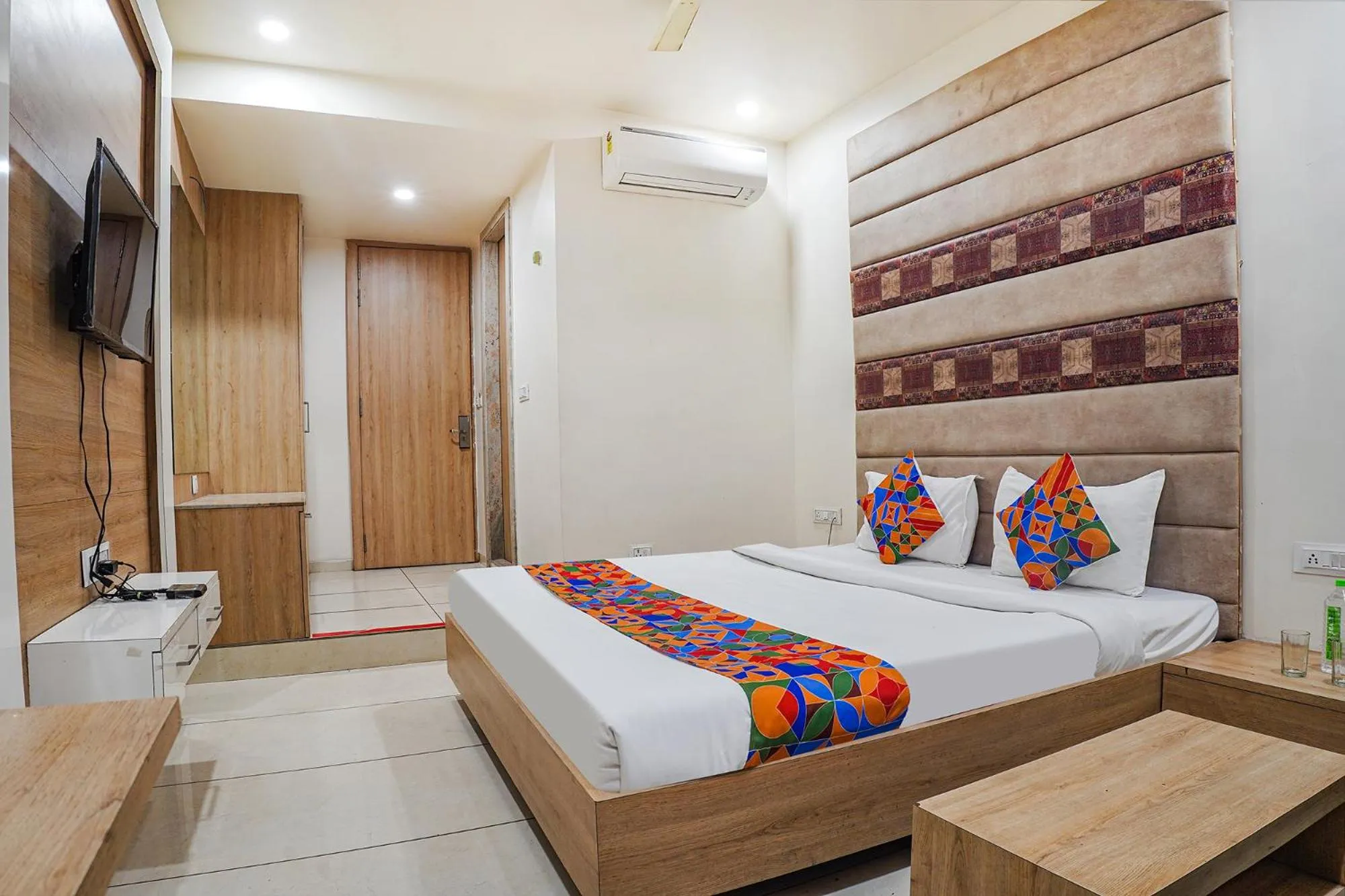 Bed in FabHotel Prime OM Palace