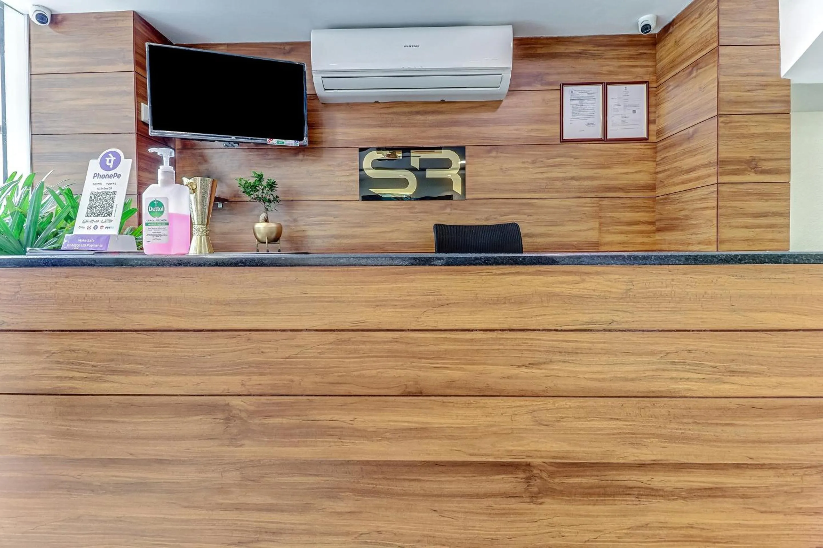 Lobby or reception in Capital O Safari Rooms Near Snow City