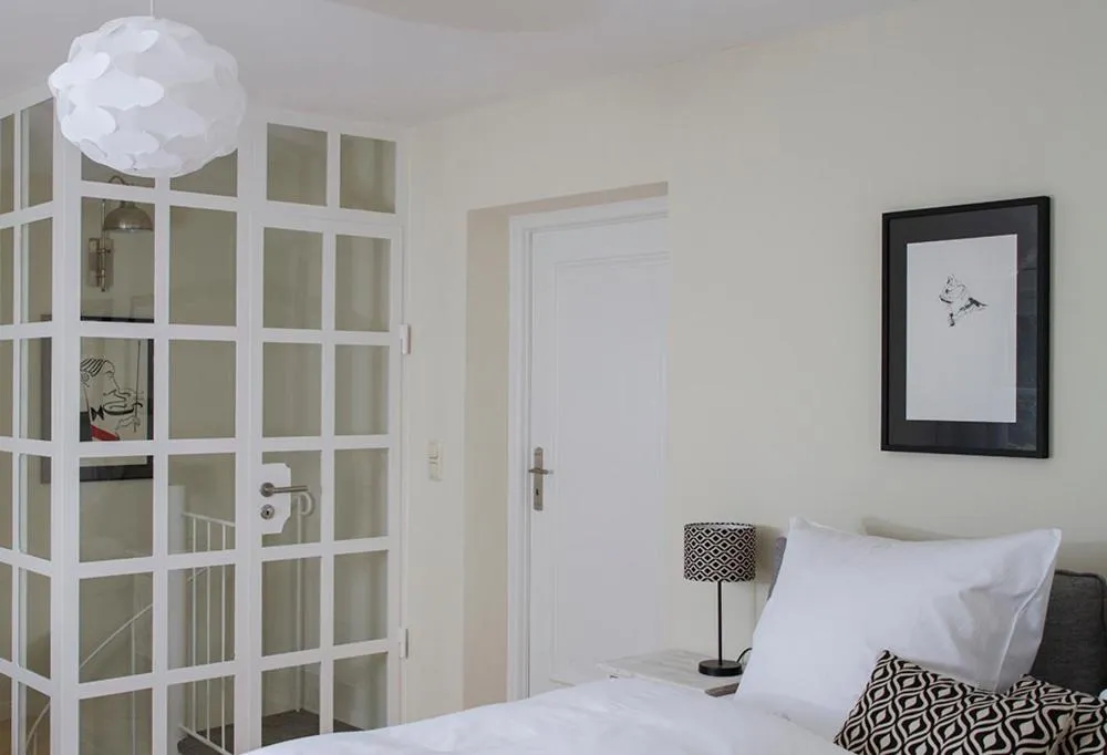 Bed in Alpenhof Garnihotel & Ferienwohnungen