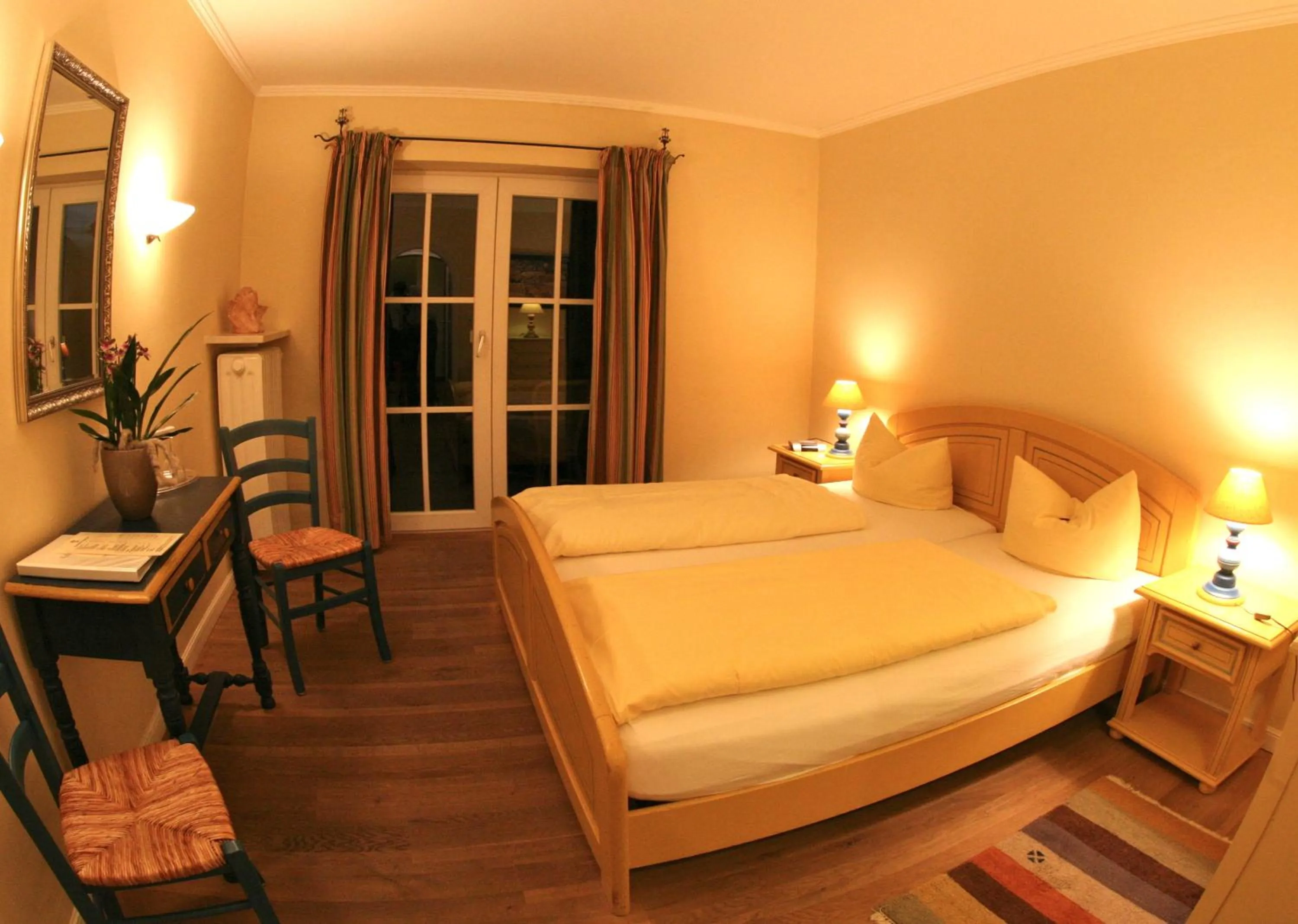 Bed in Alpenhof Garnihotel & Ferienwohnungen