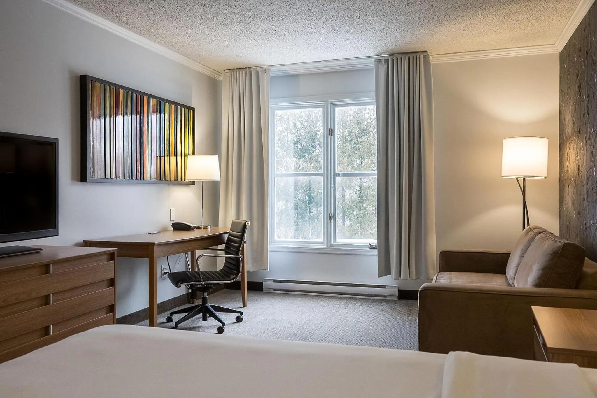 Photo of the whole room, Bed in Hotel Chateau Bromont