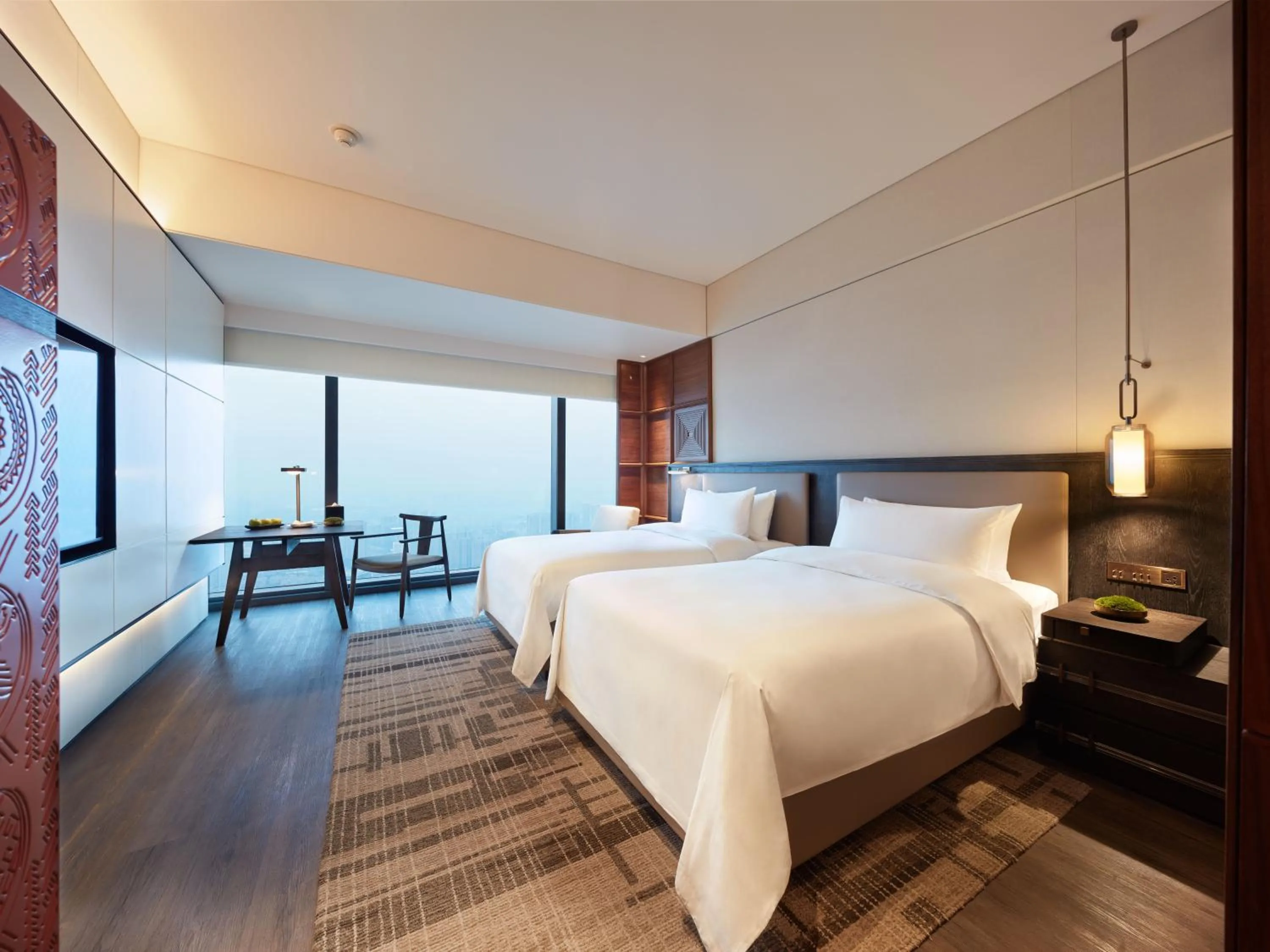 Photo of the whole room, Bed in Shangri-La Nanning - The tallest hotel worldwide in Shangri-La Group