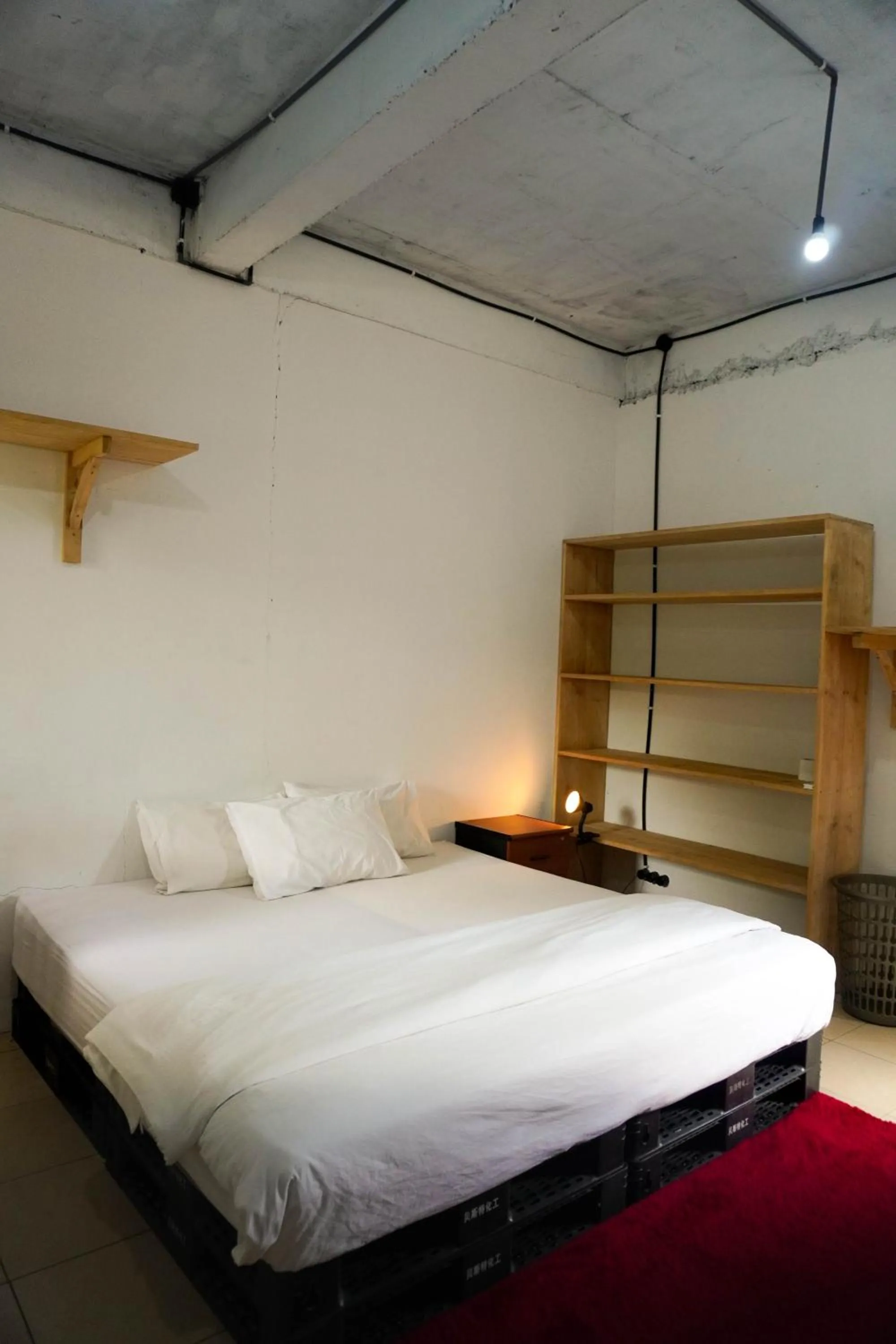 Bed in LoTide Surf Camps Lombok