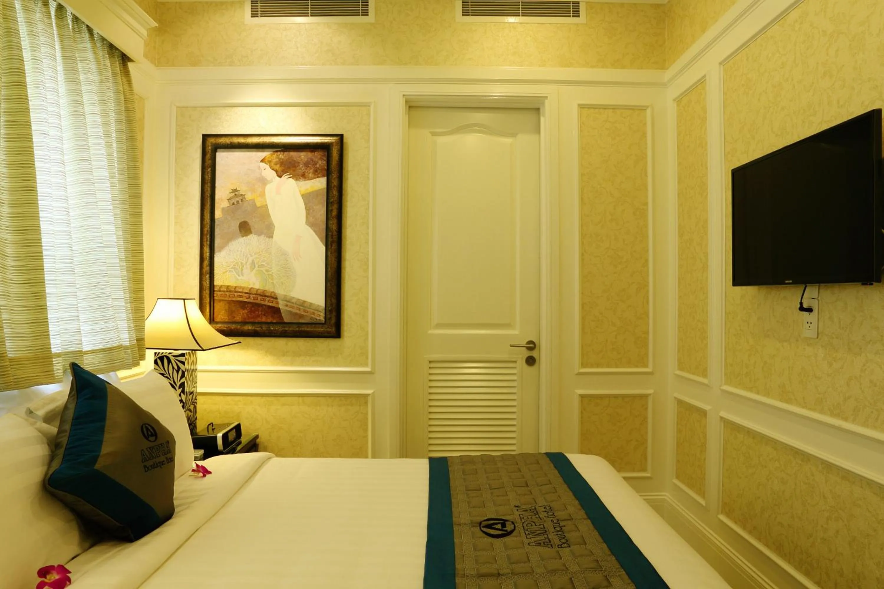 Bed in Anpha Boutique Hotel