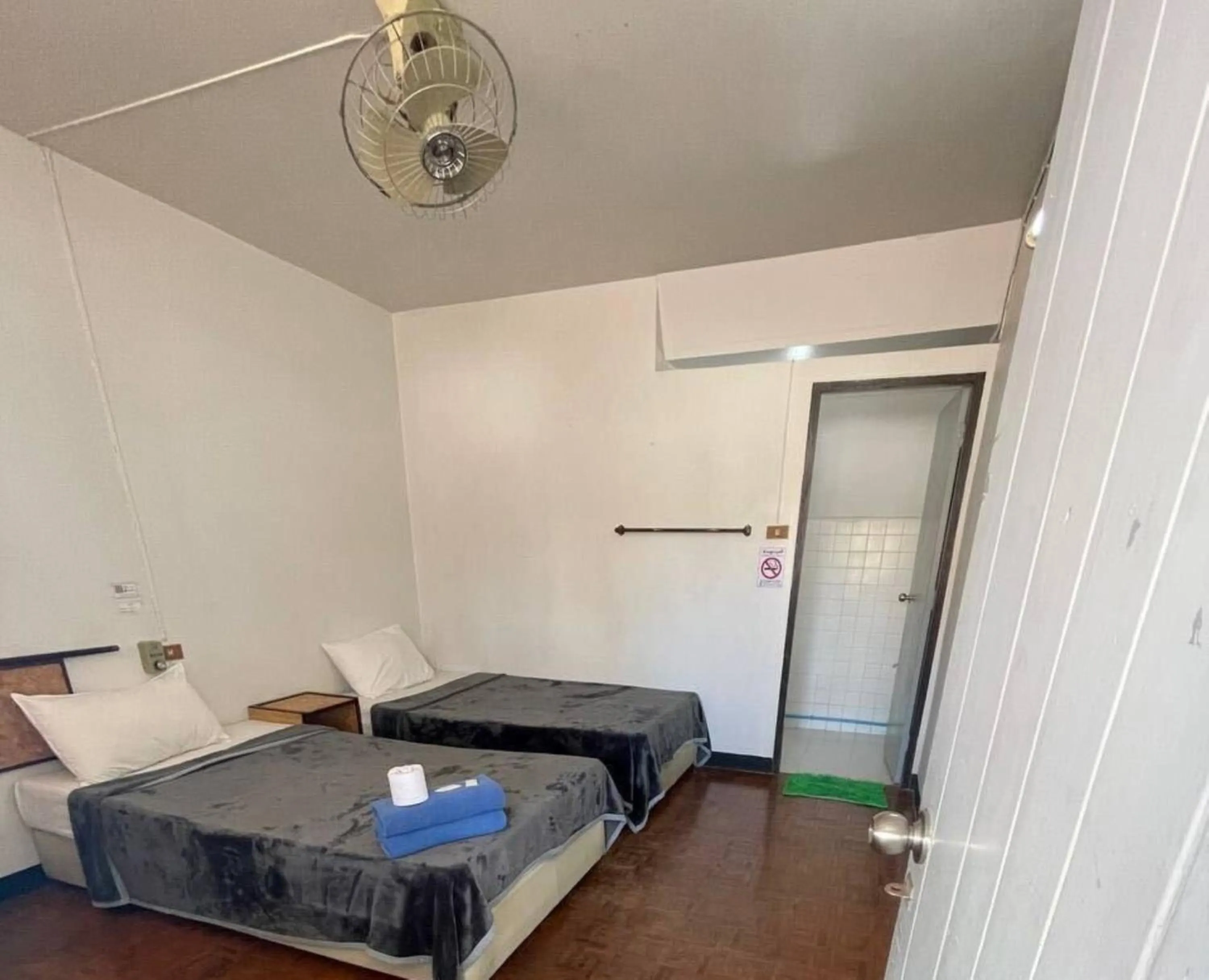 Bed in Chomdoi House Hotel