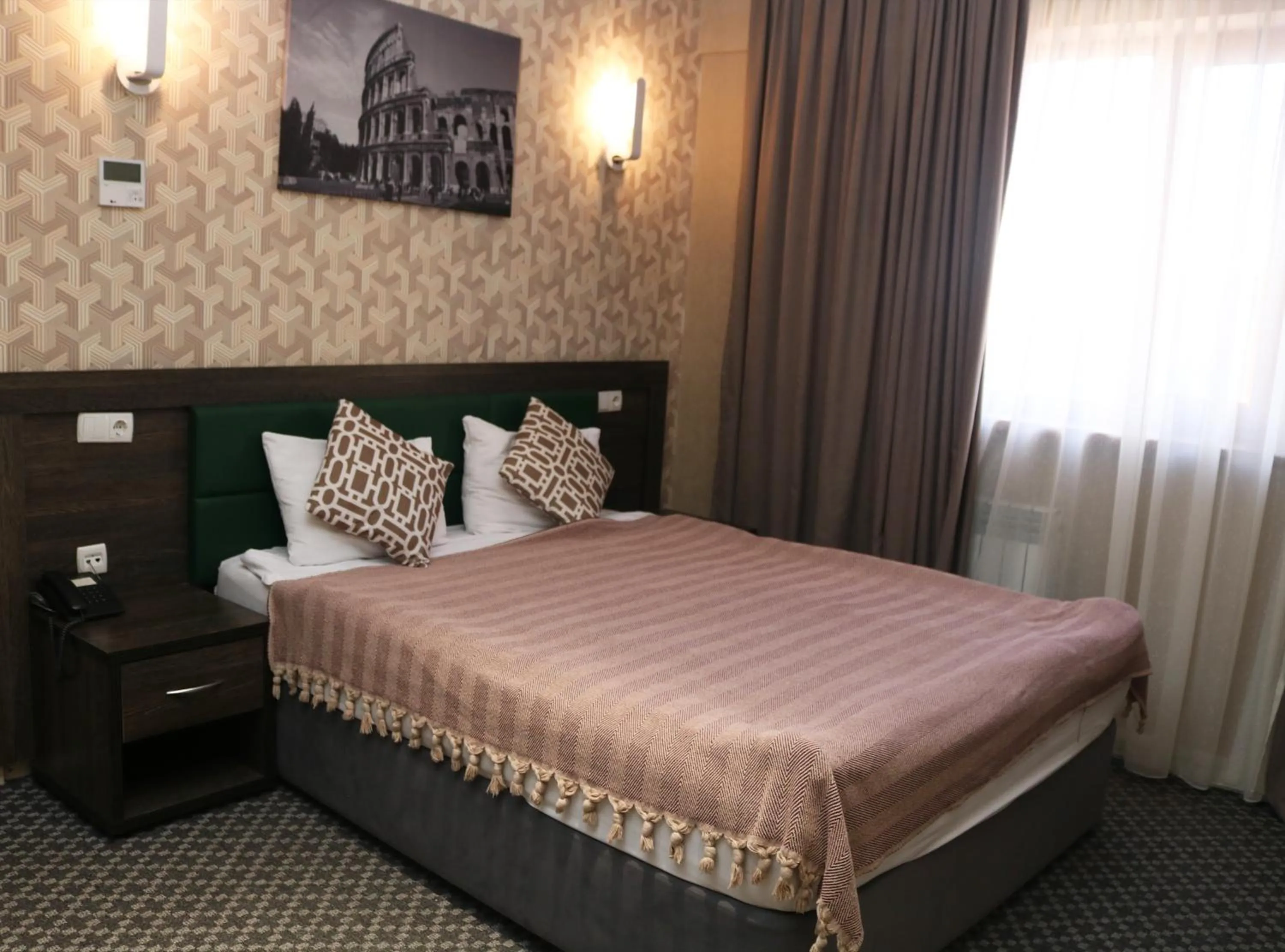 Bed in Golden Palace Hotel