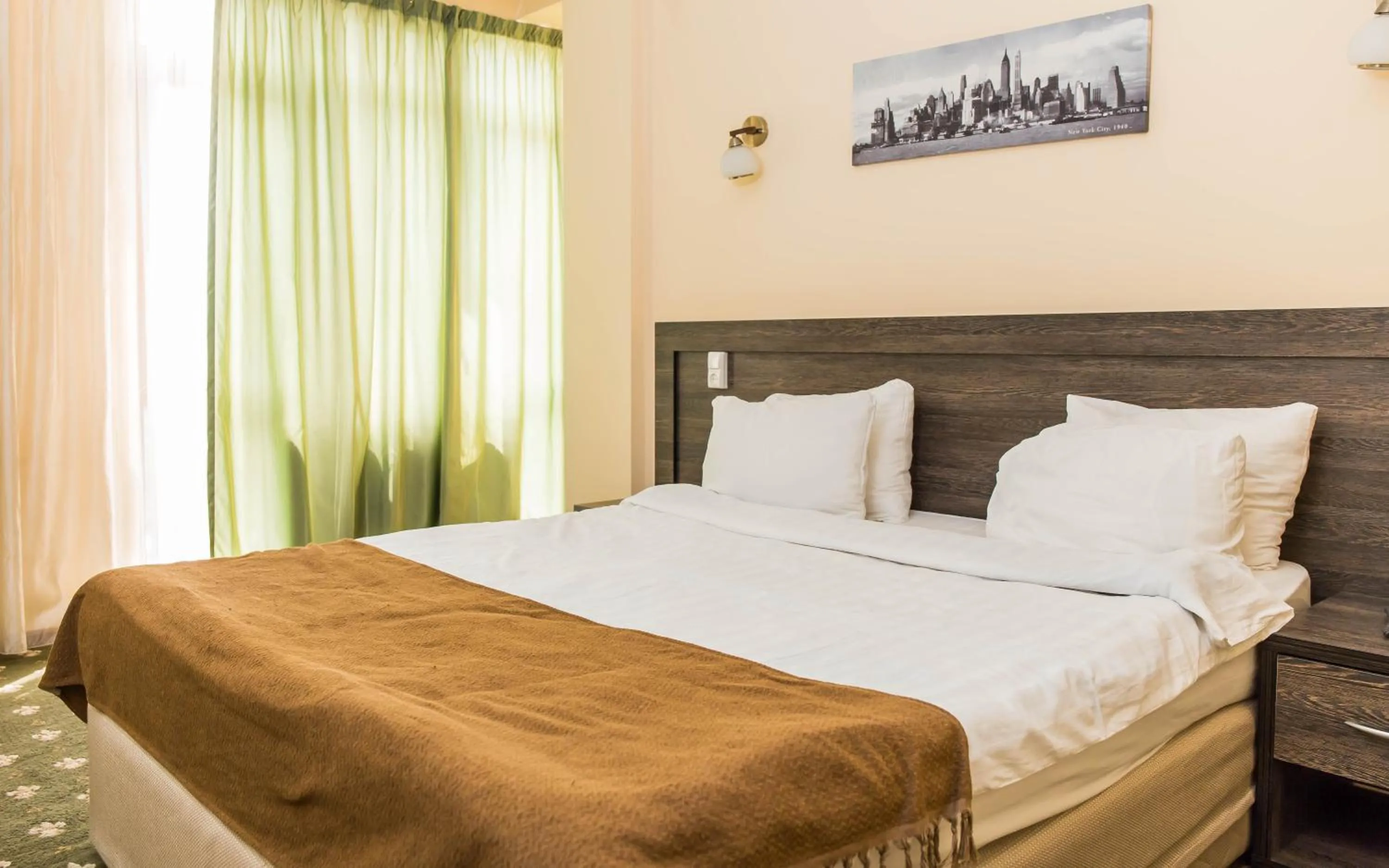 Bed in Golden Palace Hotel