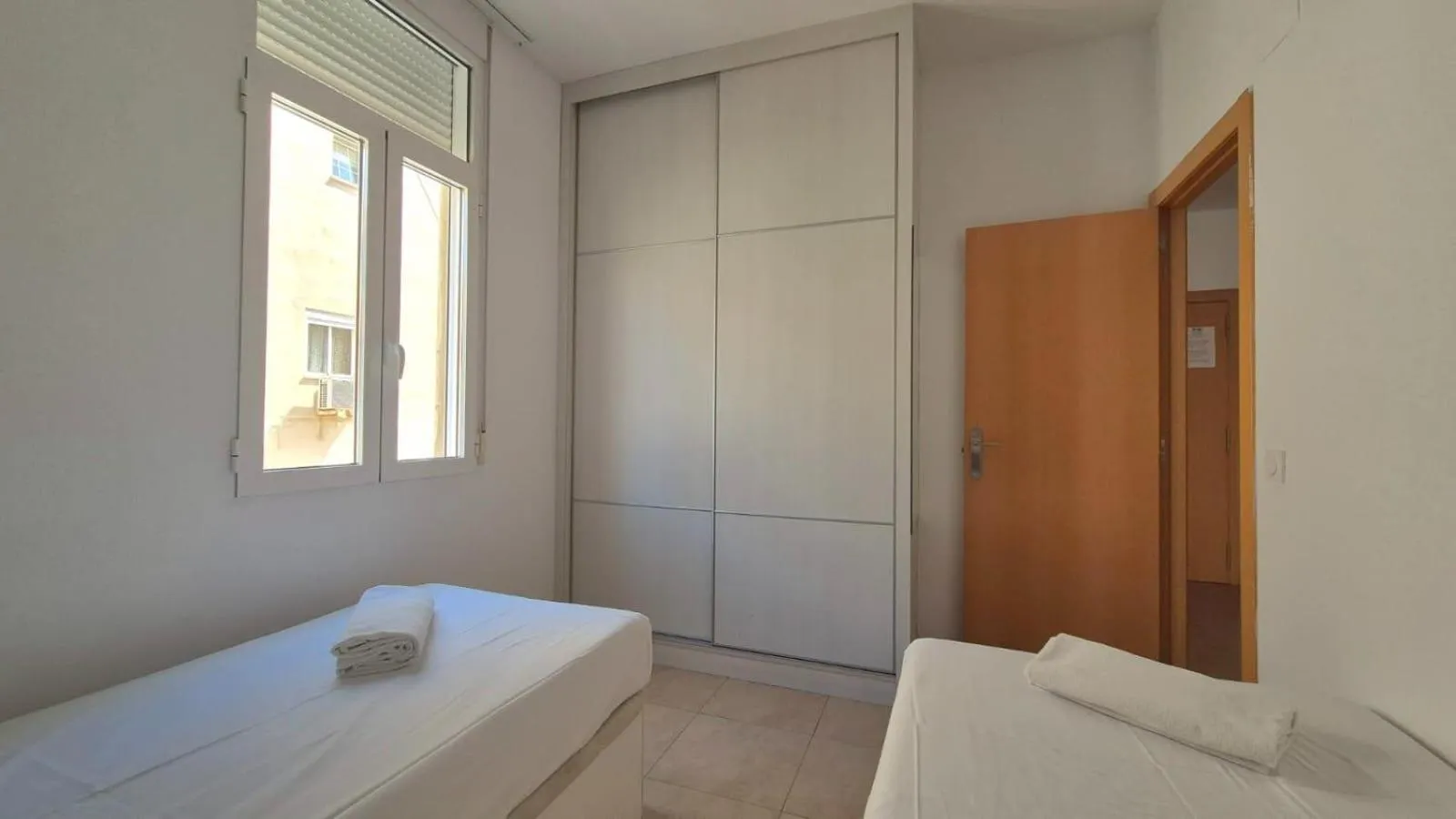 Bed in Luxury Apartments Puerto Valencia