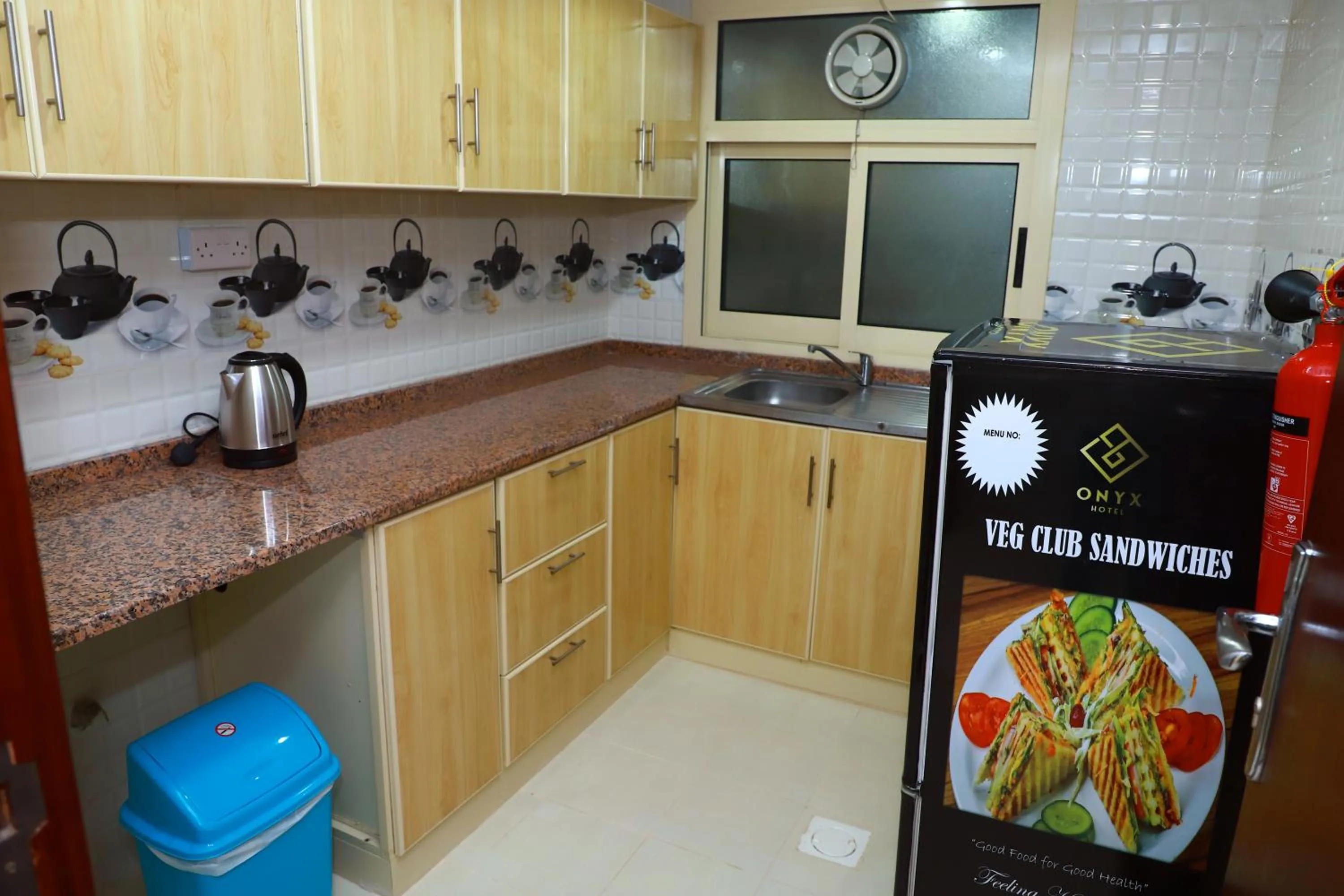 Kitchen or kitchenette in Onyx Hotel Apartments - MAHA HOSPITALITY GROUP