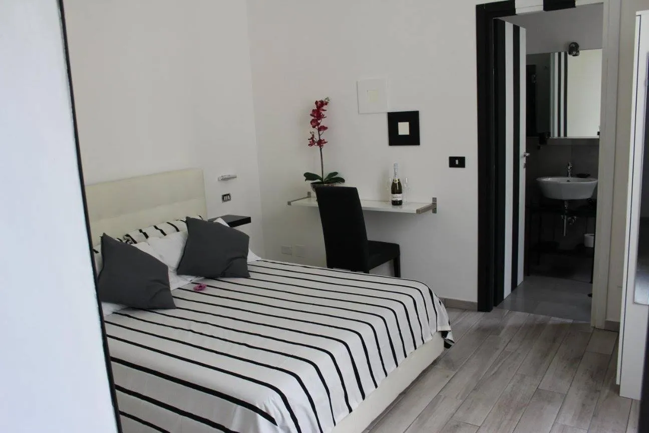 Bed in Lazy Gio Guest House