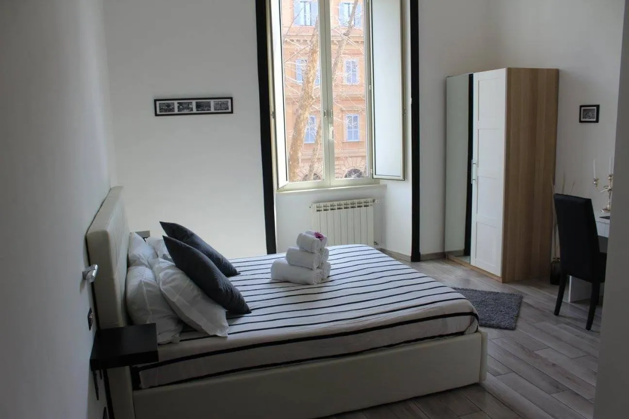 Bed in Lazy Gio Guest House