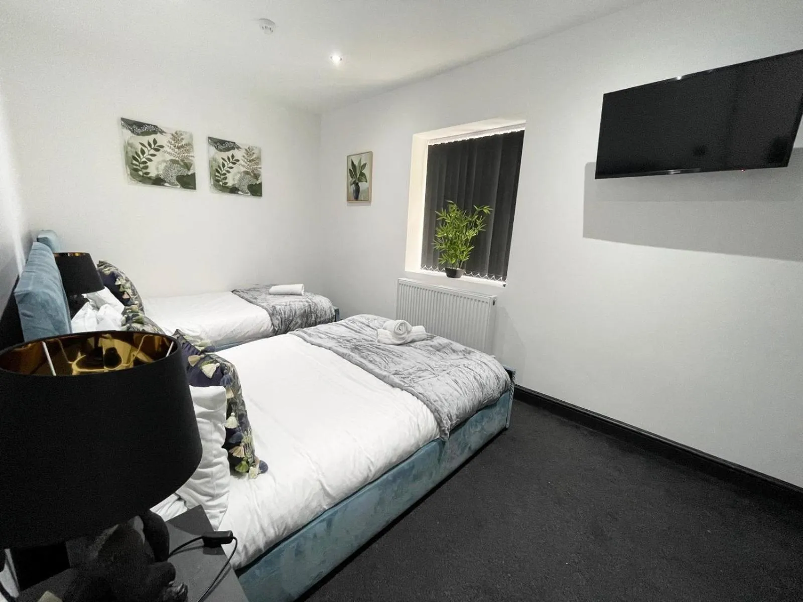 Bedroom, Bed in Wellington Suites by Sasco Apartments