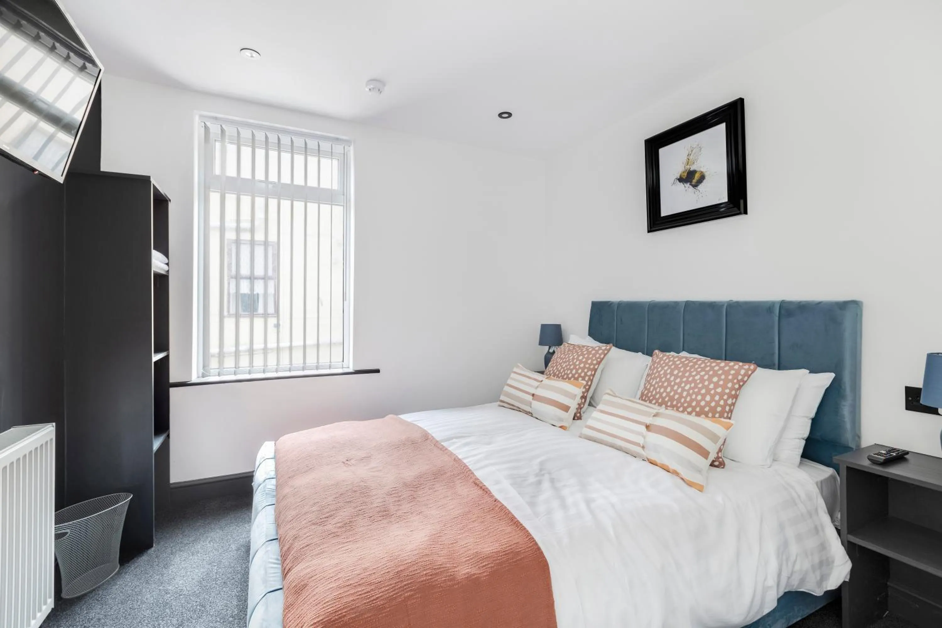 Bedroom, Bed in Wellington Suites by Sasco Apartments