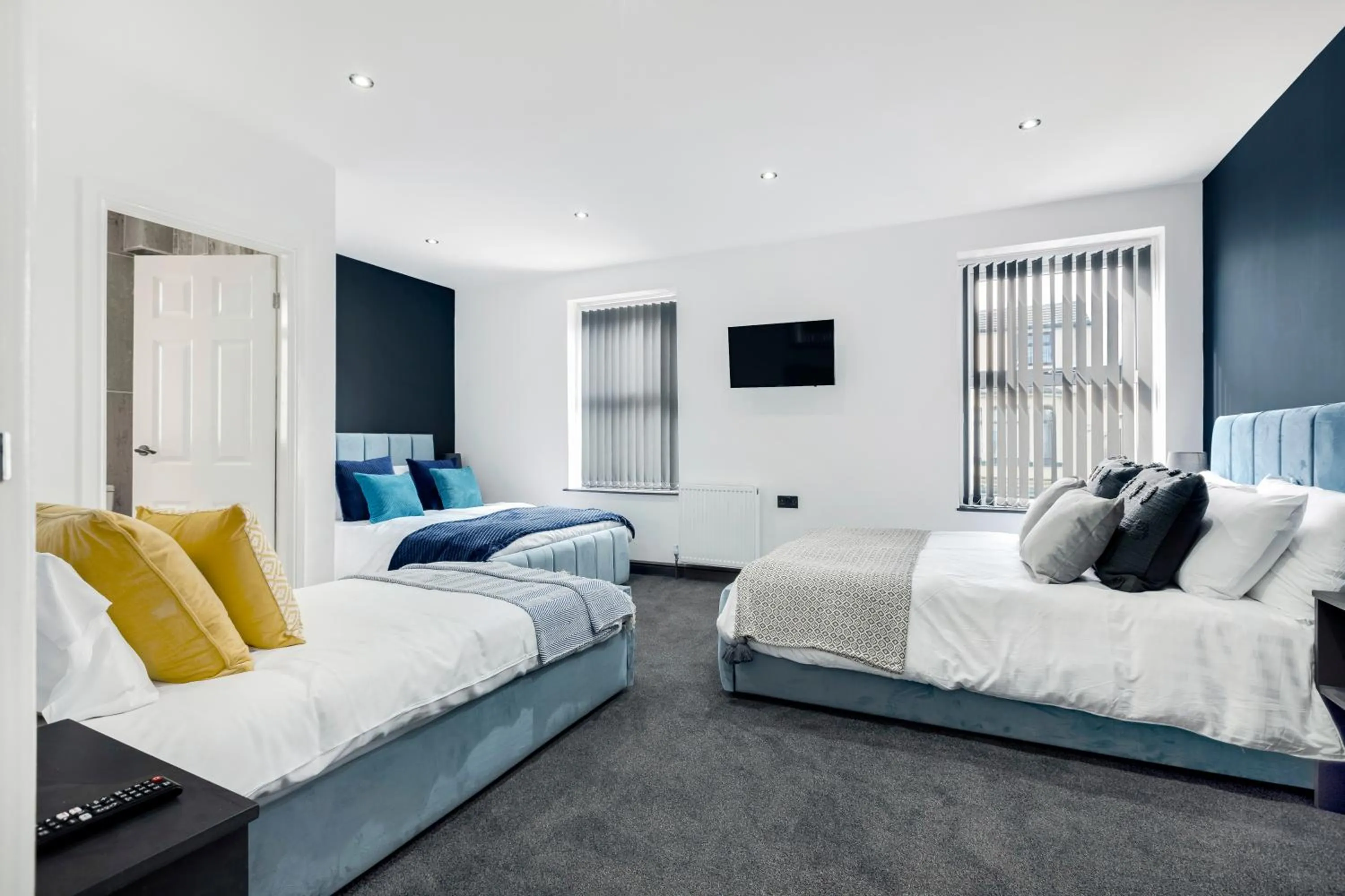 Bedroom, Bed in Wellington Suites by Sasco Apartments