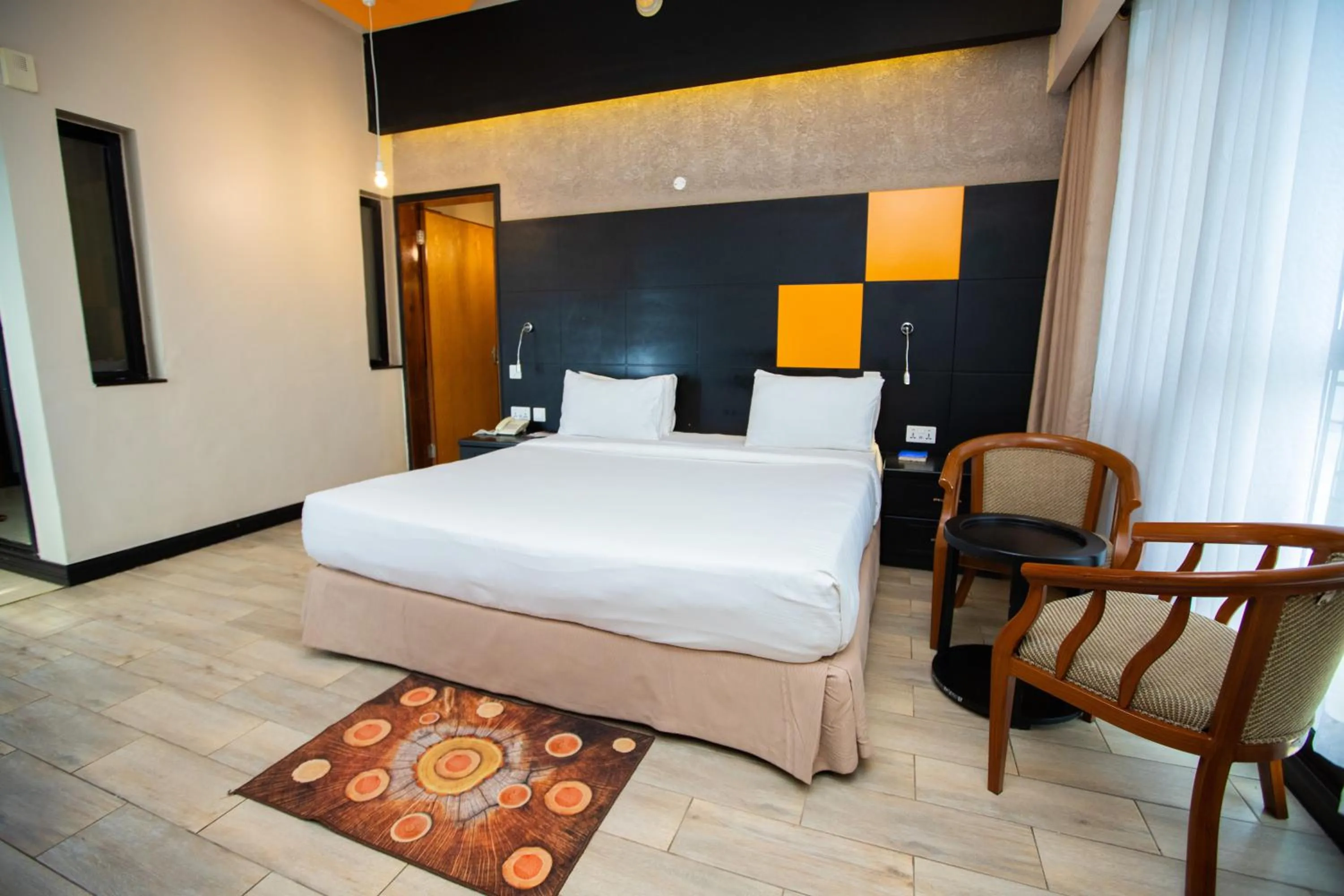 Bed in Gold Crest Hotel