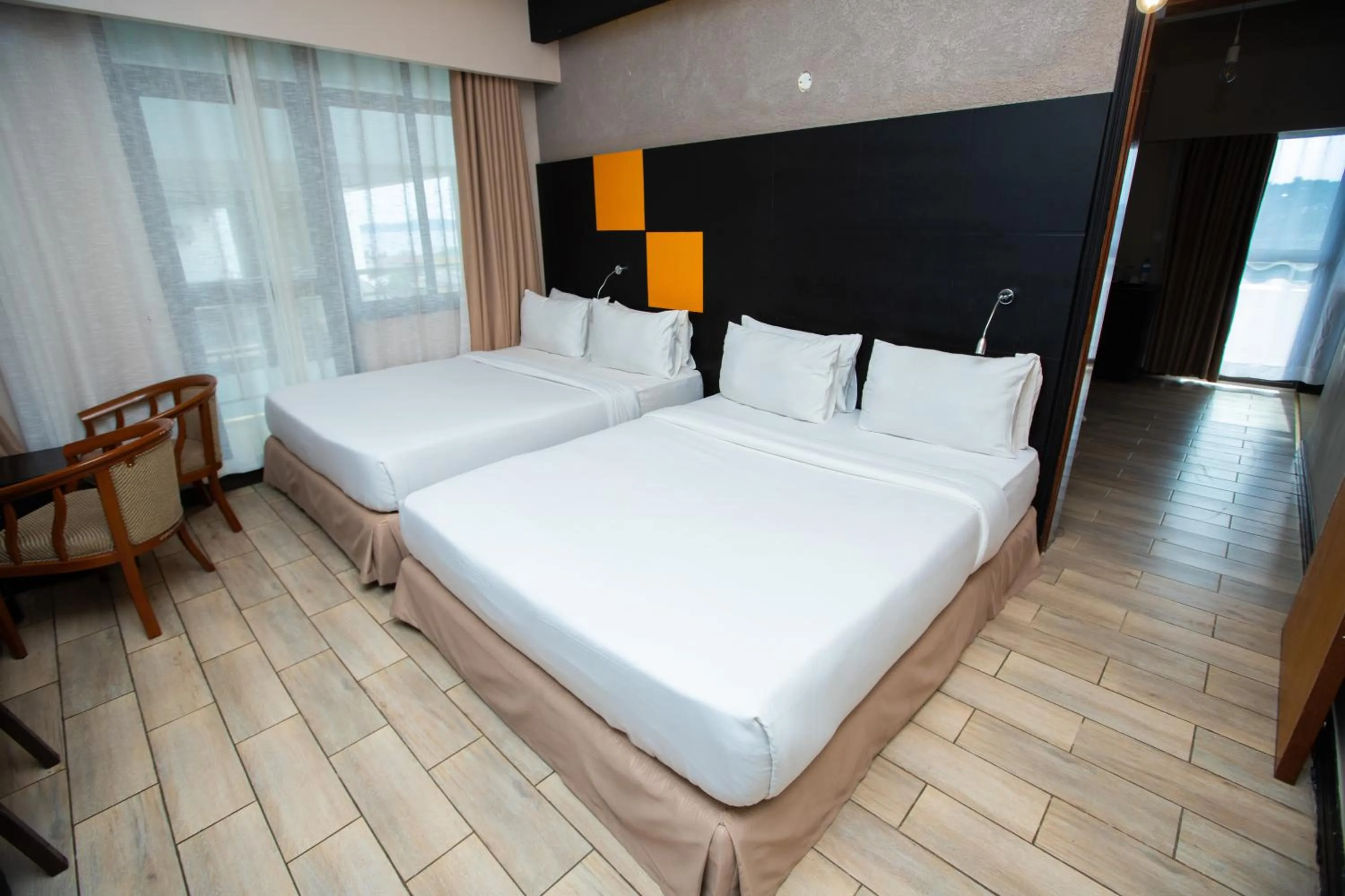 Bed in Gold Crest Hotel