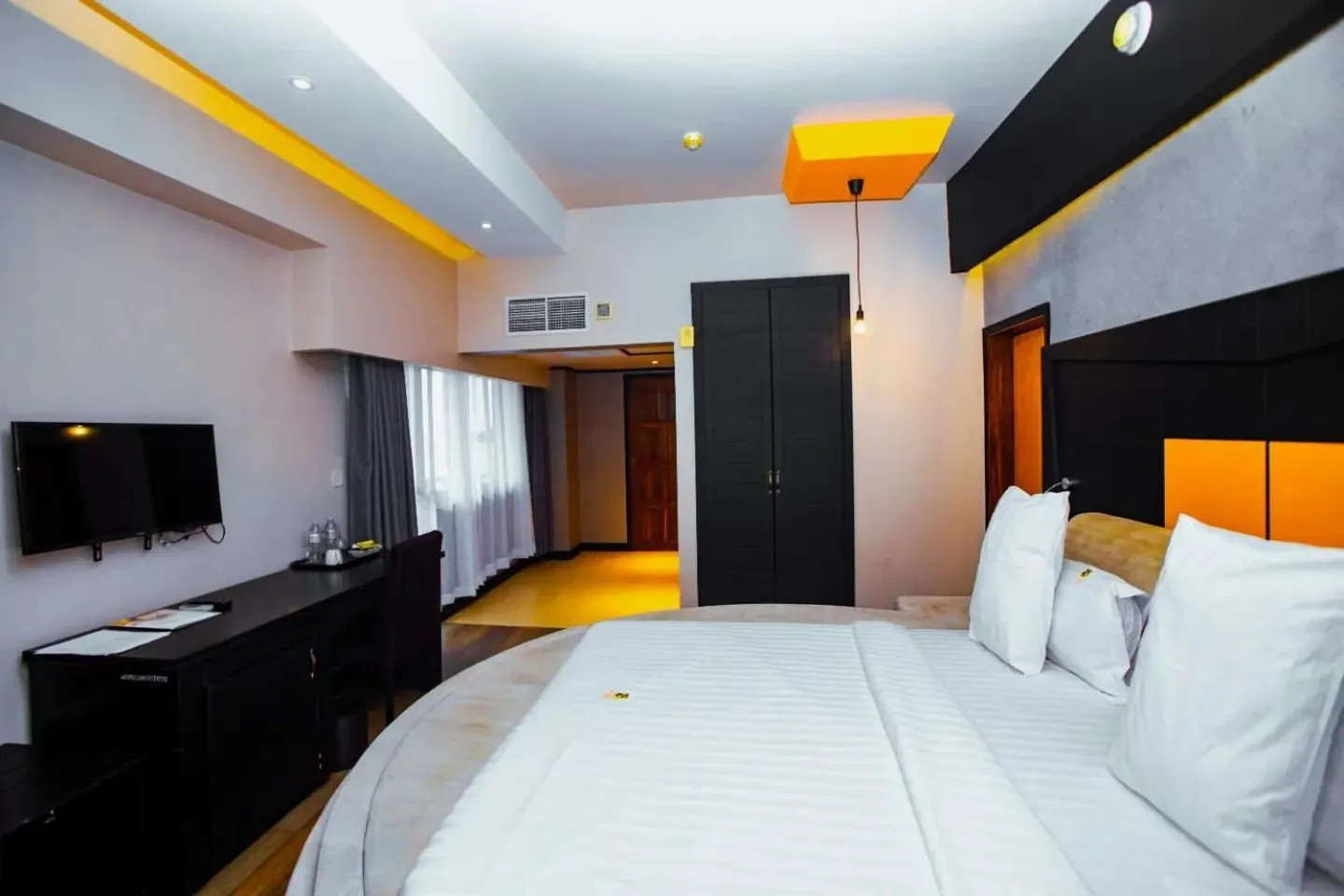 Bed in Gold Crest Hotel