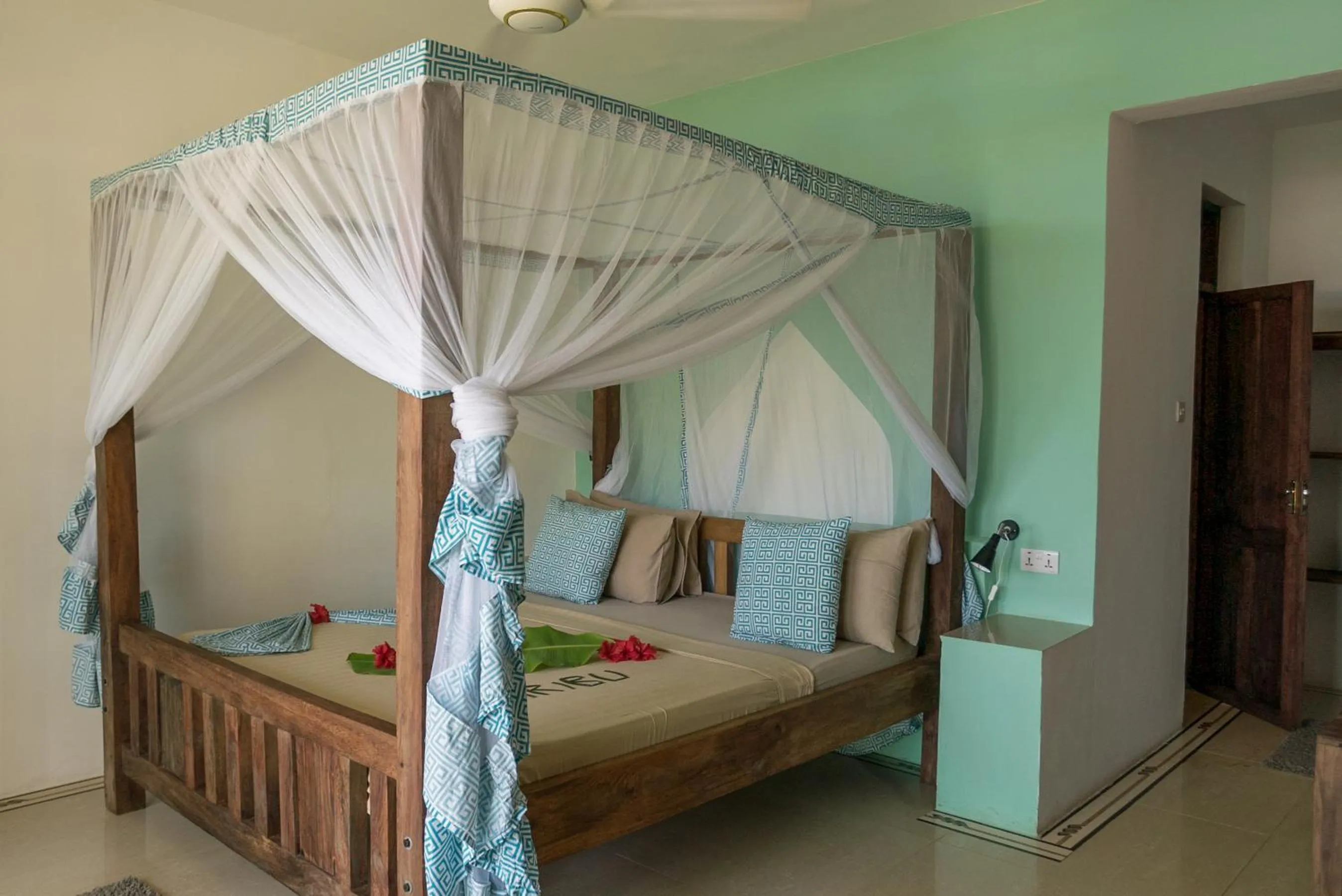 Bed in Reef & Beach Resort - Spa Jambiani