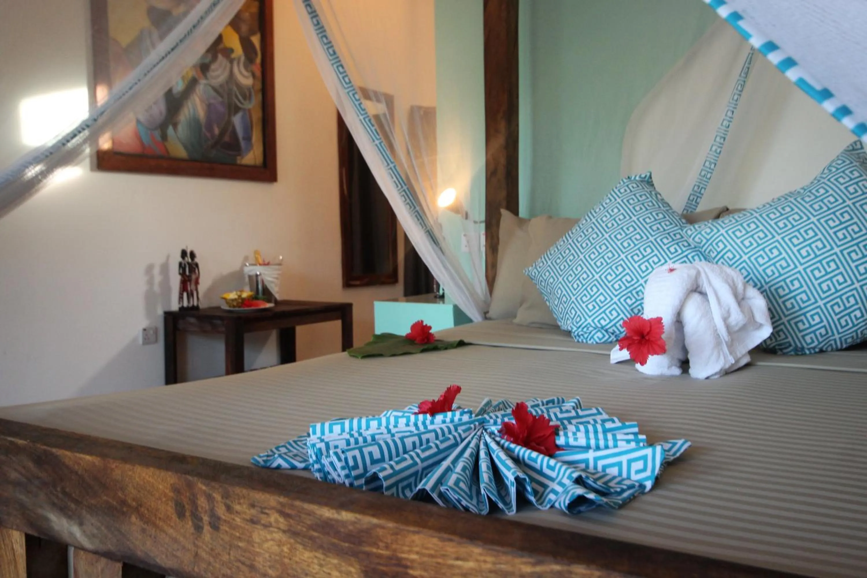 Bed in Reef & Beach Resort - Spa Jambiani