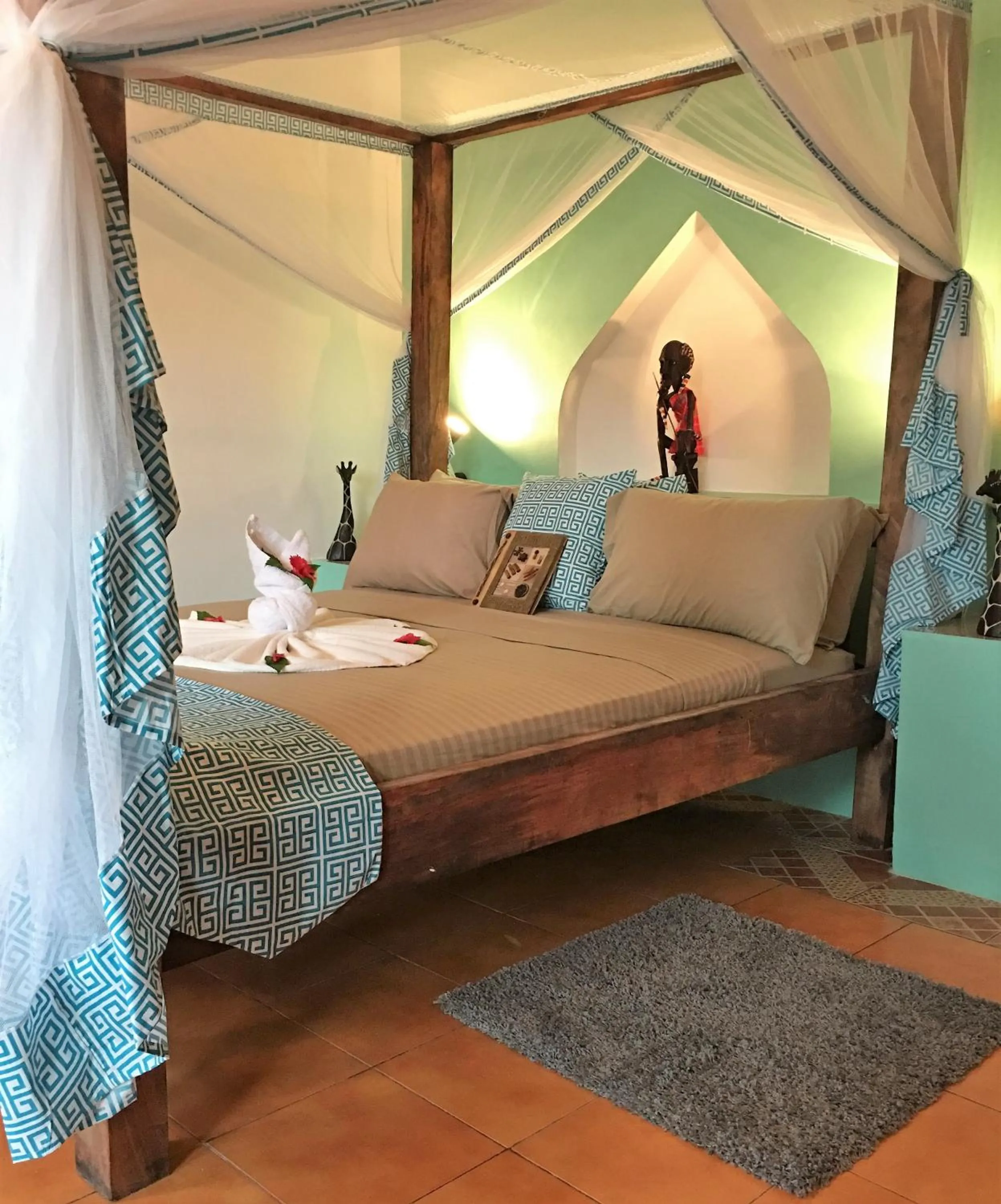 Bed in Reef & Beach Resort - Spa Jambiani