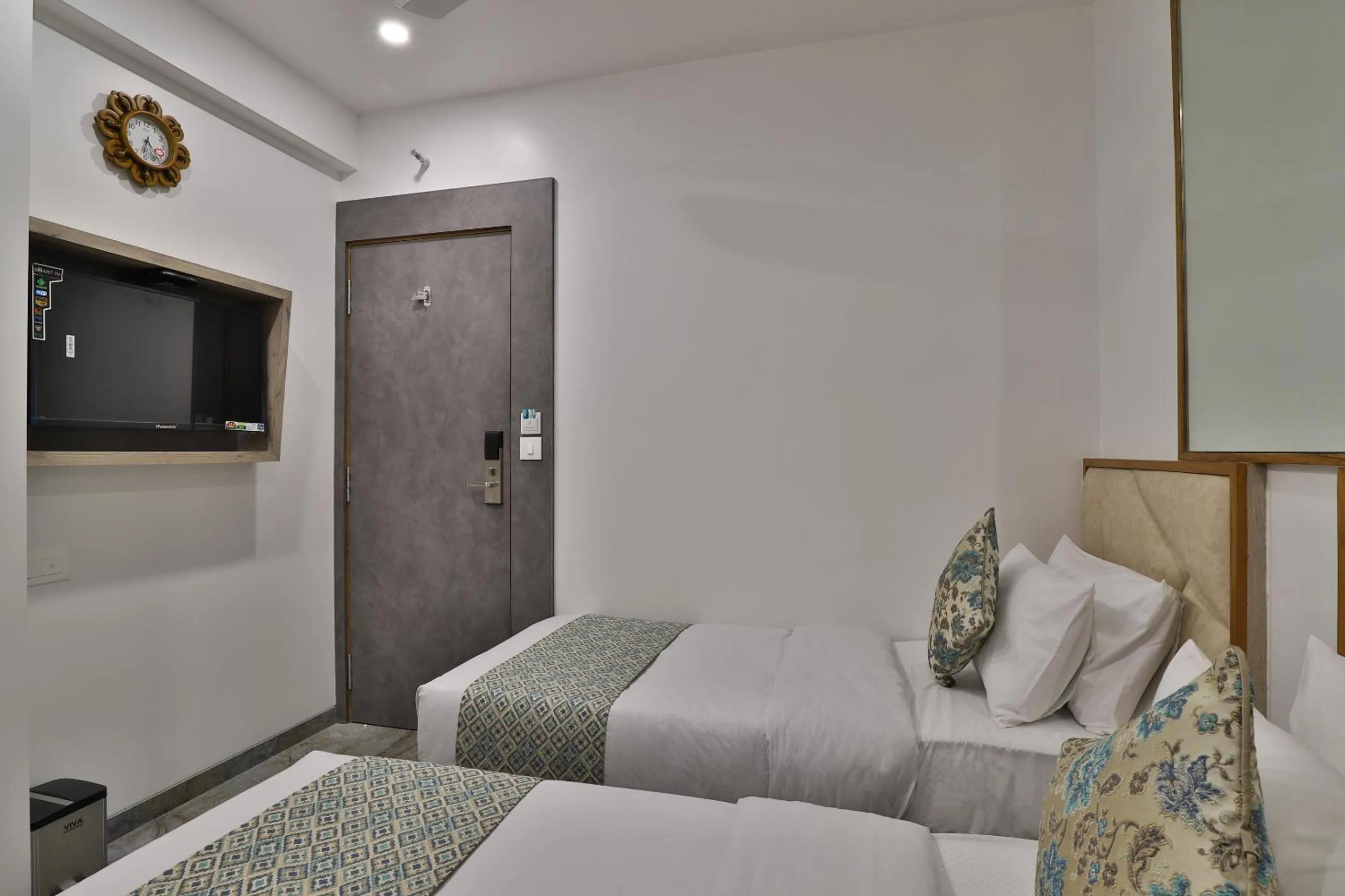 Photo of the whole room, Bed in 7 Orbit Hotel, Surat