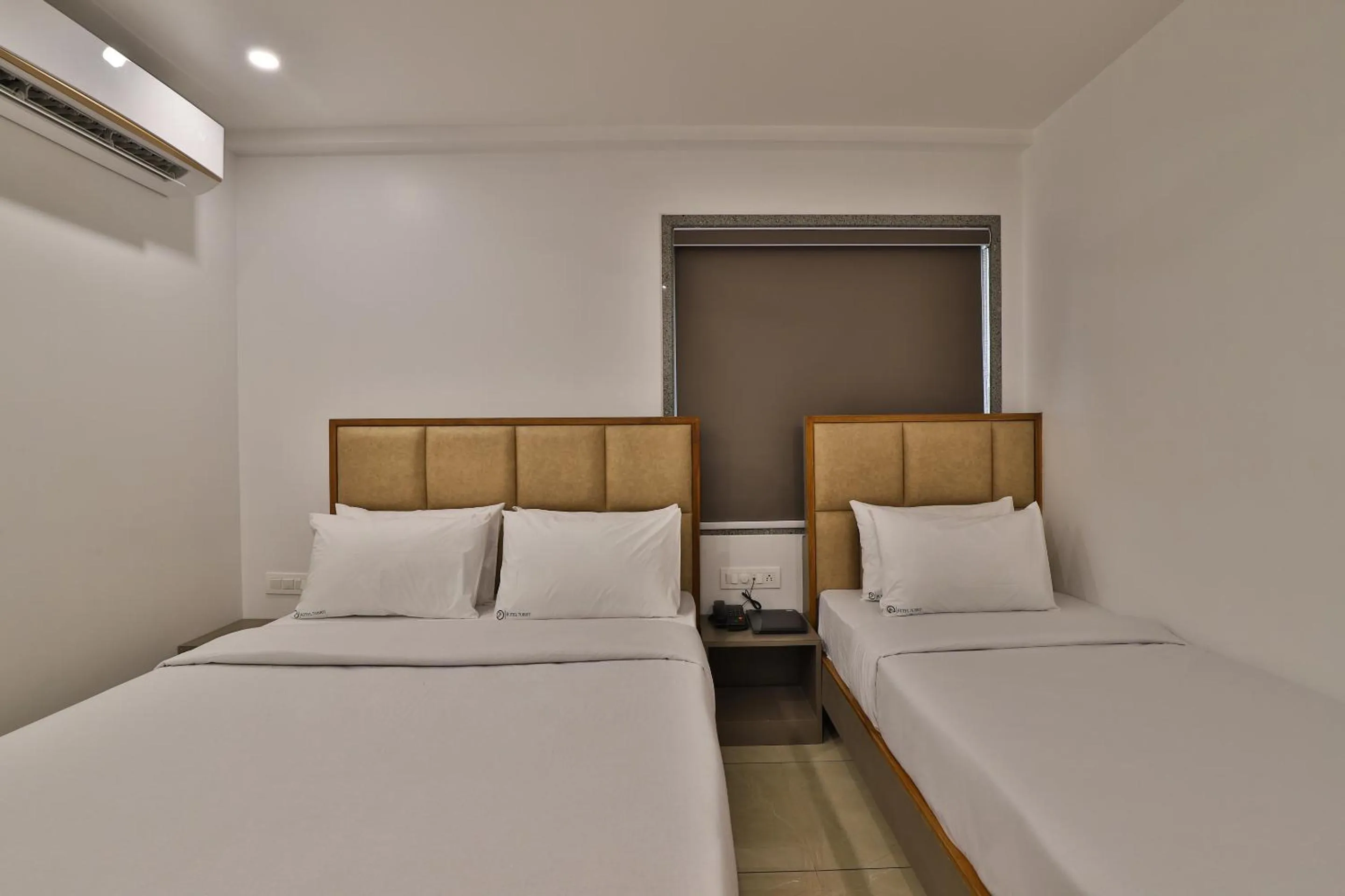 Photo of the whole room, Bed in 7 Orbit Hotel, Surat