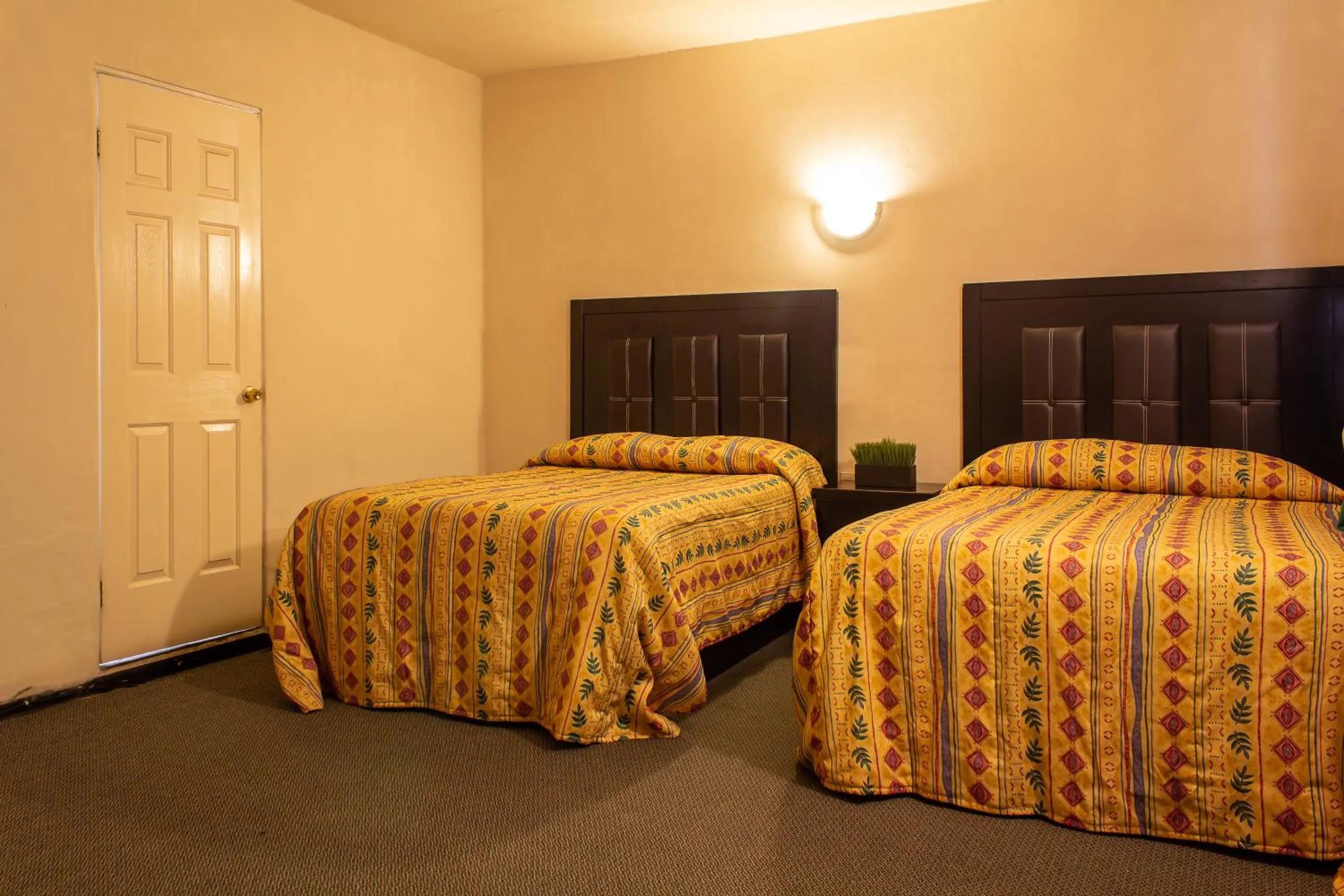 Bed in BONITTO INN® Manuel