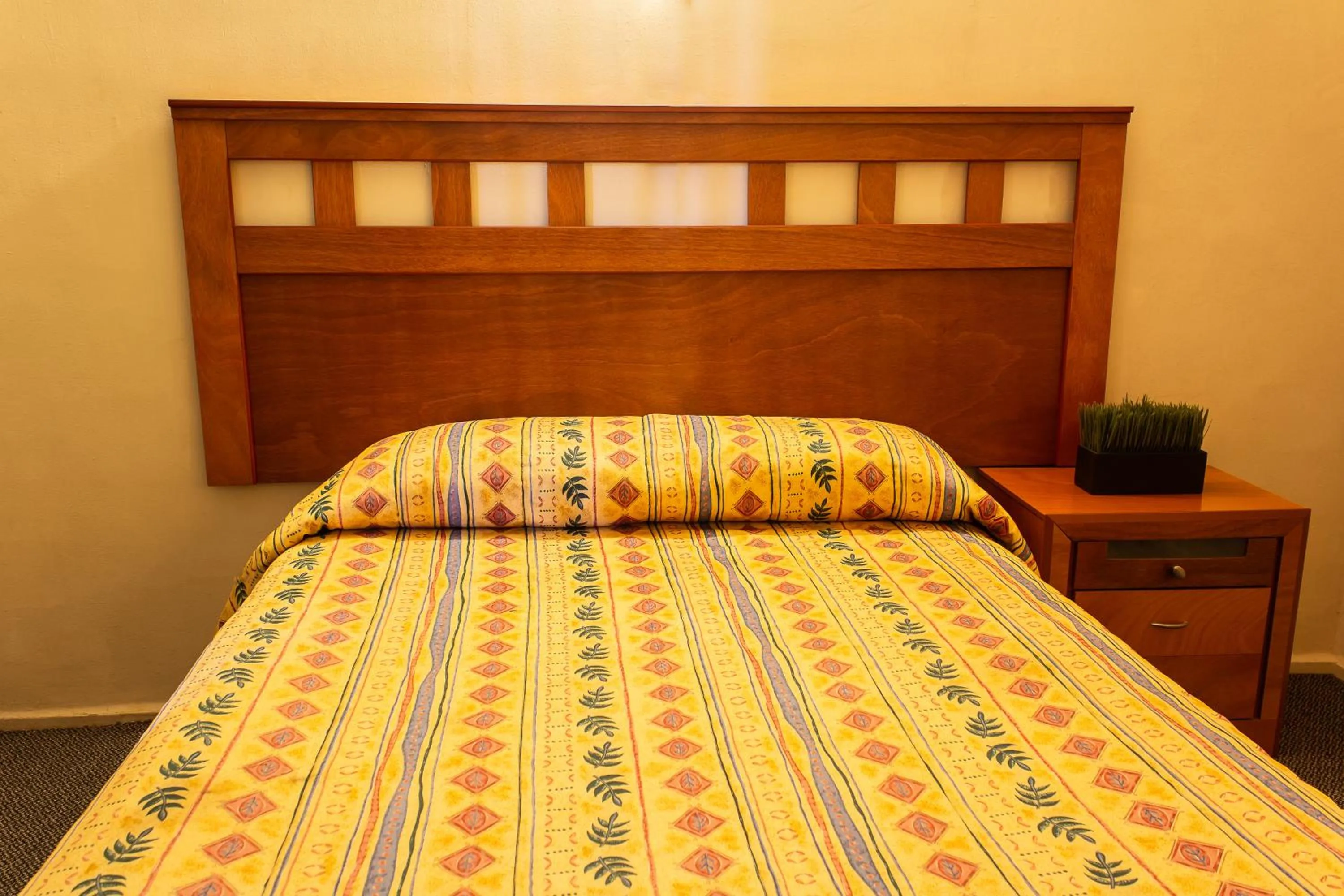 Bed in BONITTO INN® Manuel