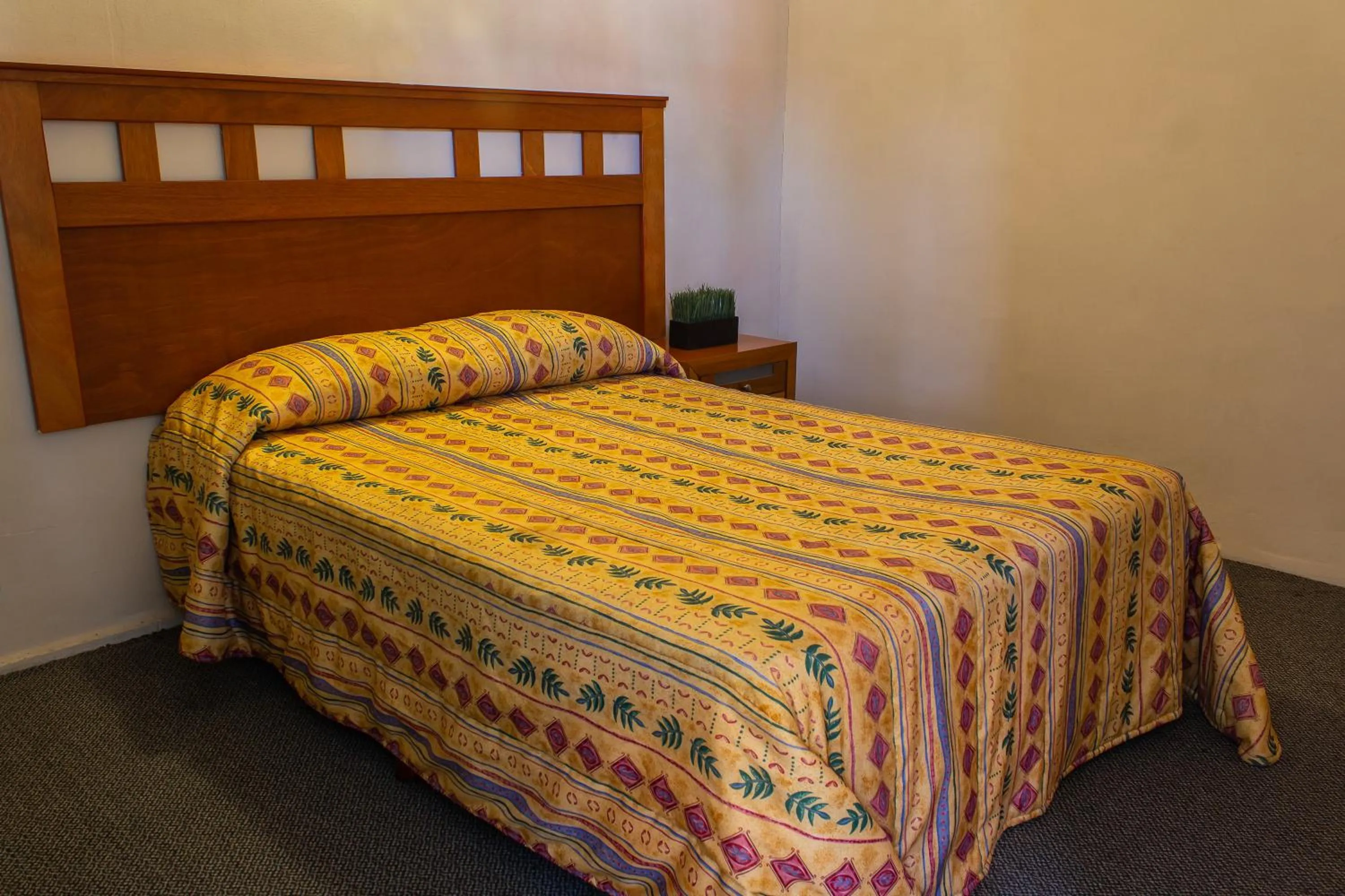 Bed in BONITTO INN® Manuel