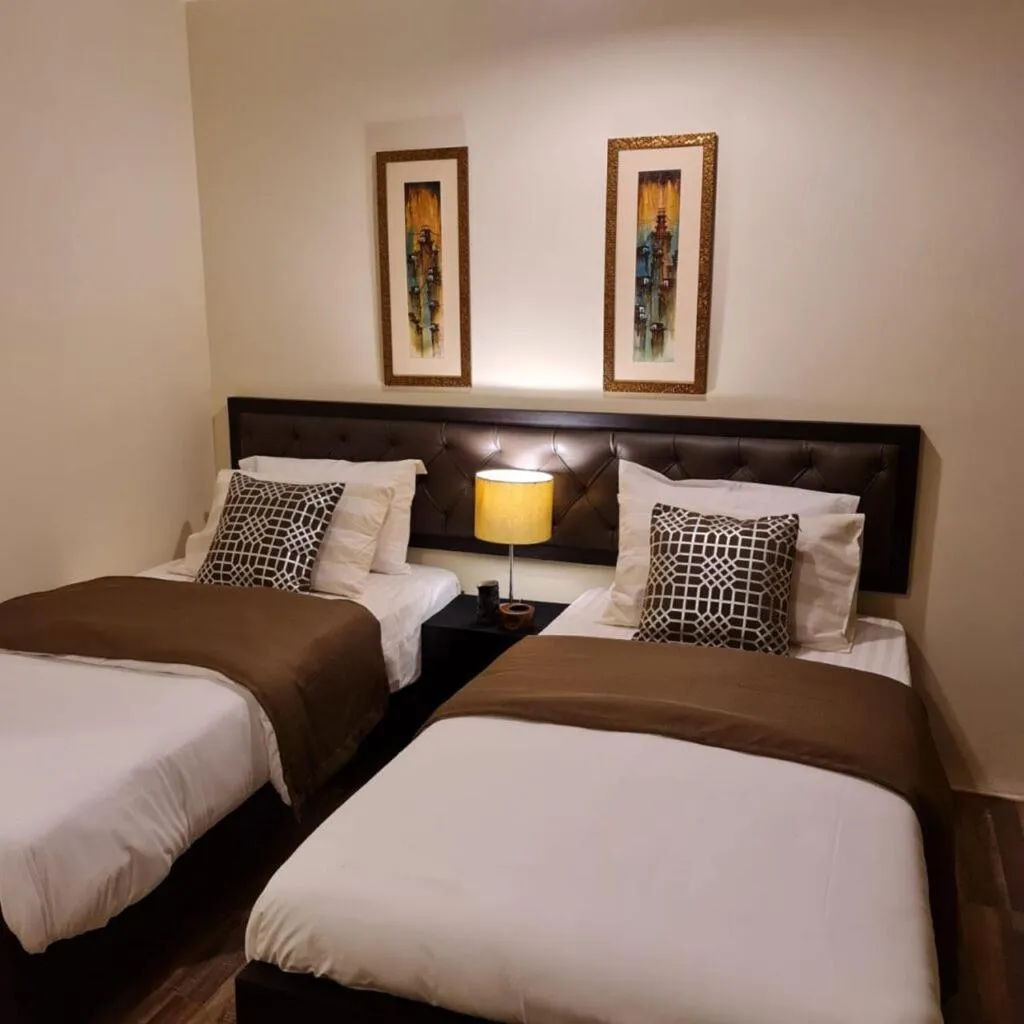 Bed in The Mandarin Inn