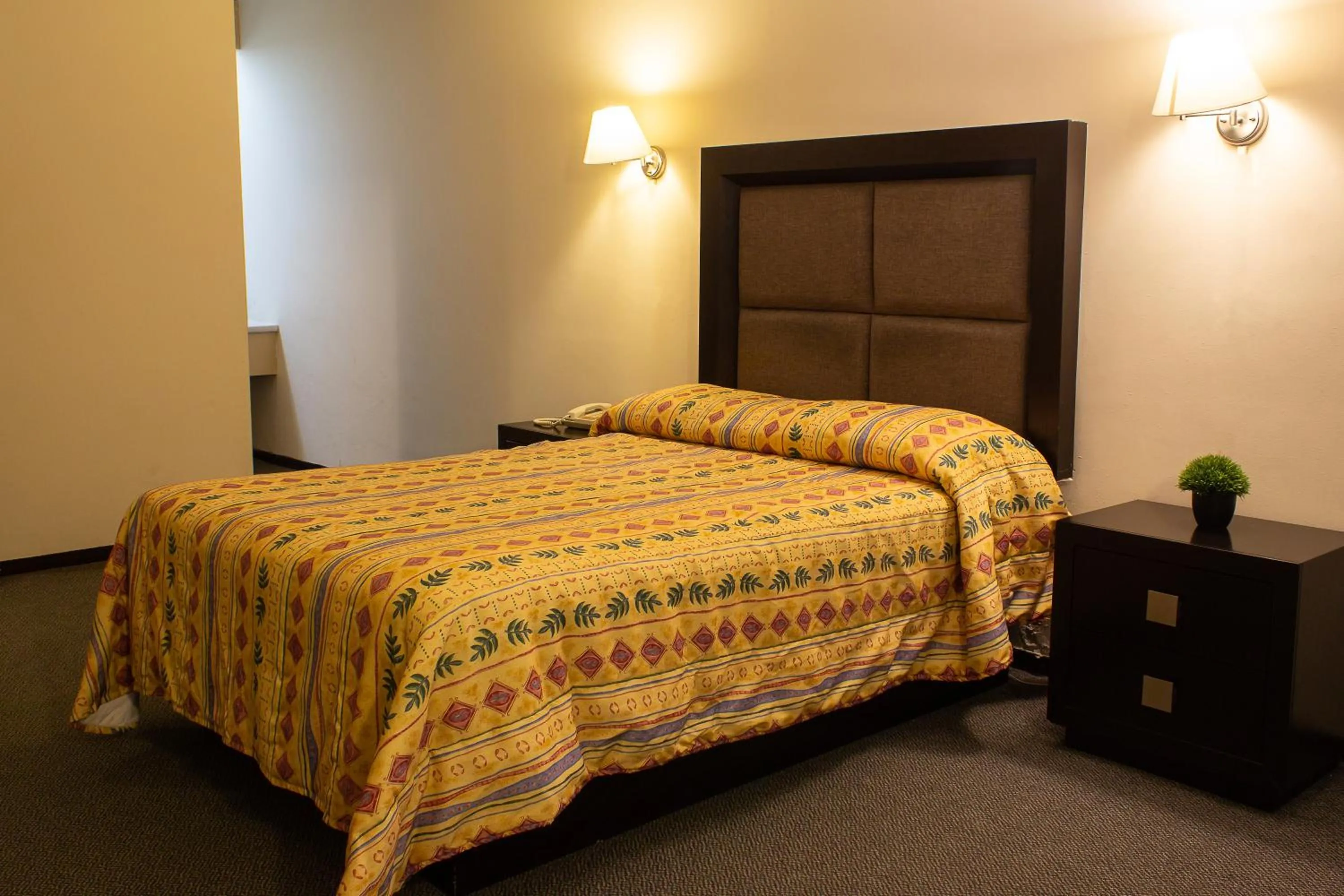 Bed in BONITTO INN® Gonzalez