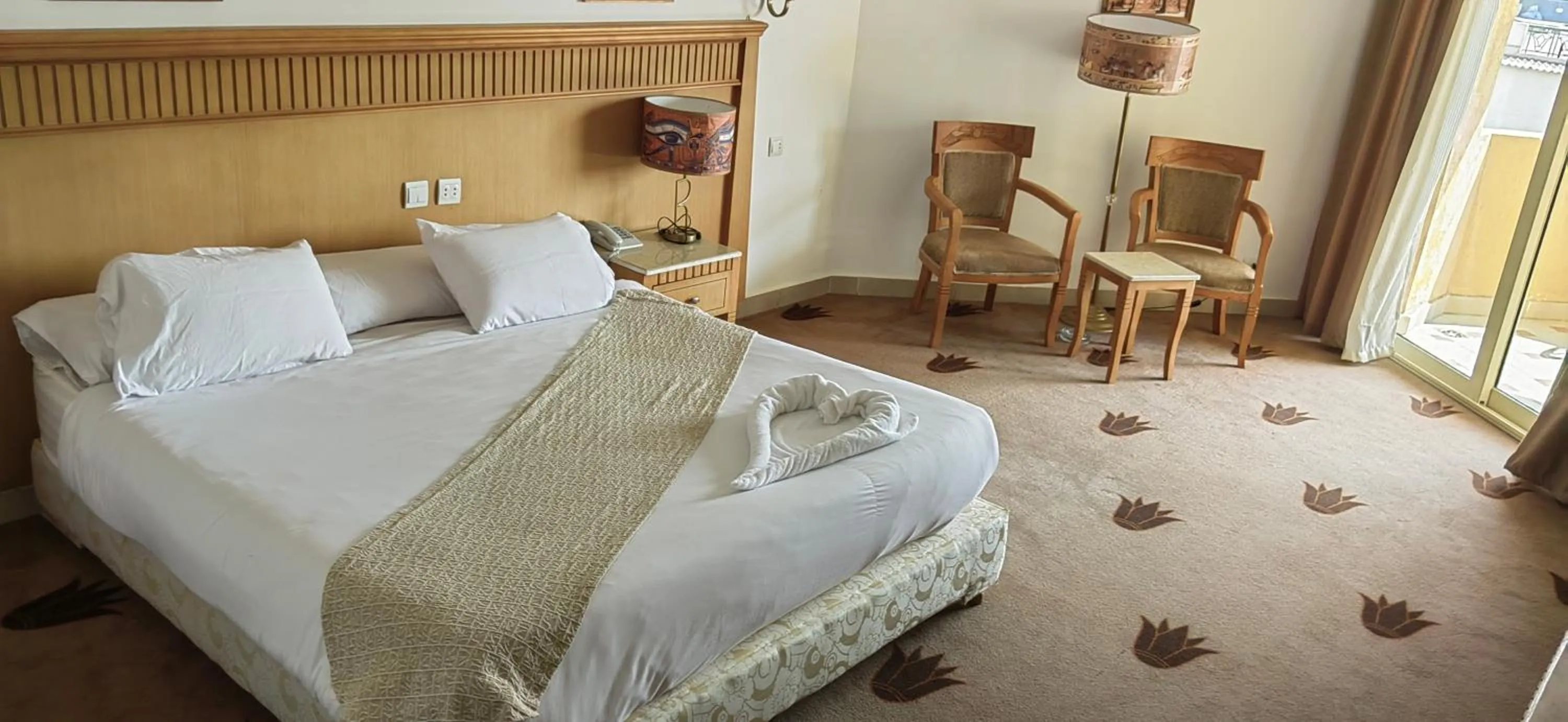 Bed in Regency Pyramids Hotel