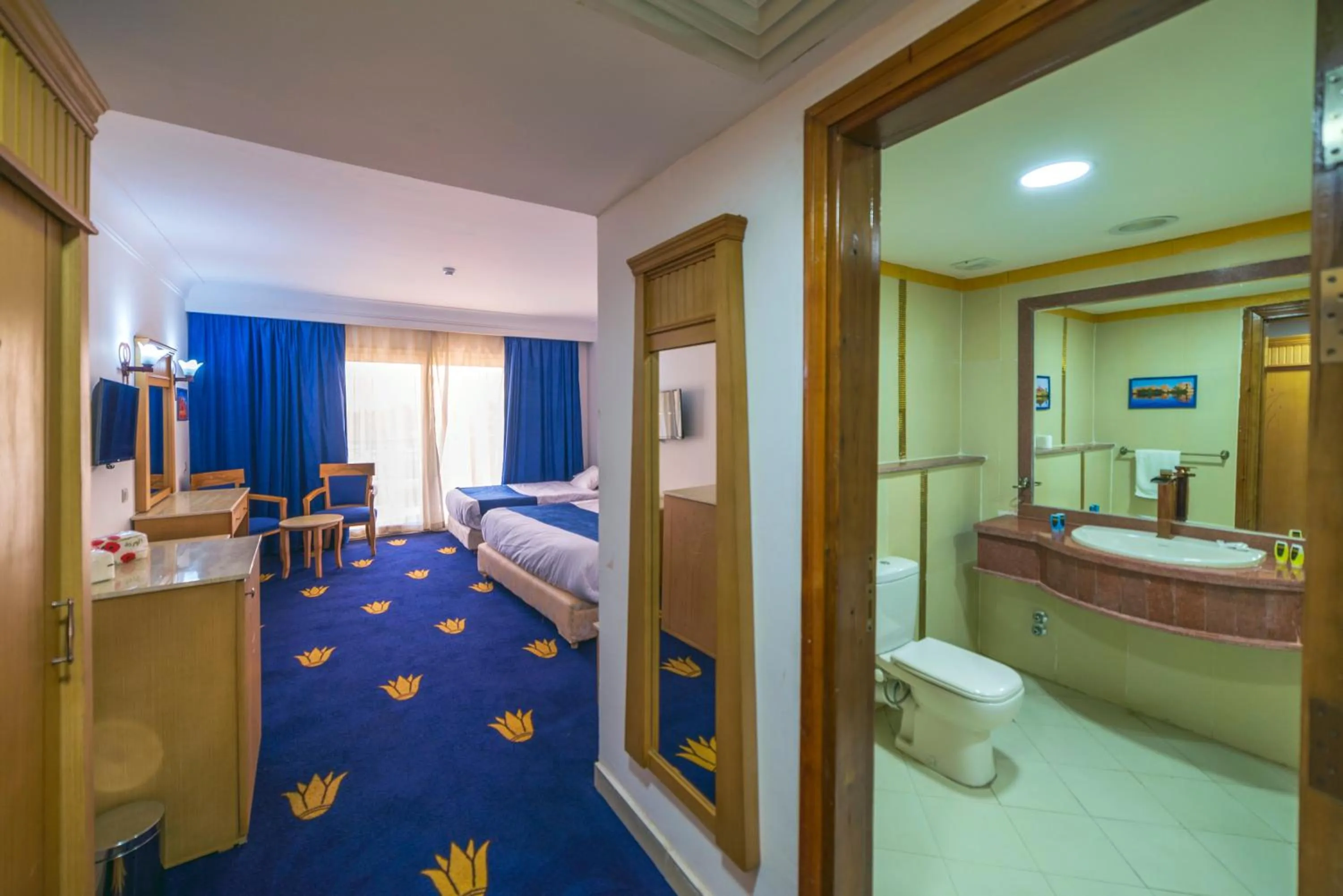 Photo of the whole room, Bed in Regency Pyramids Hotel