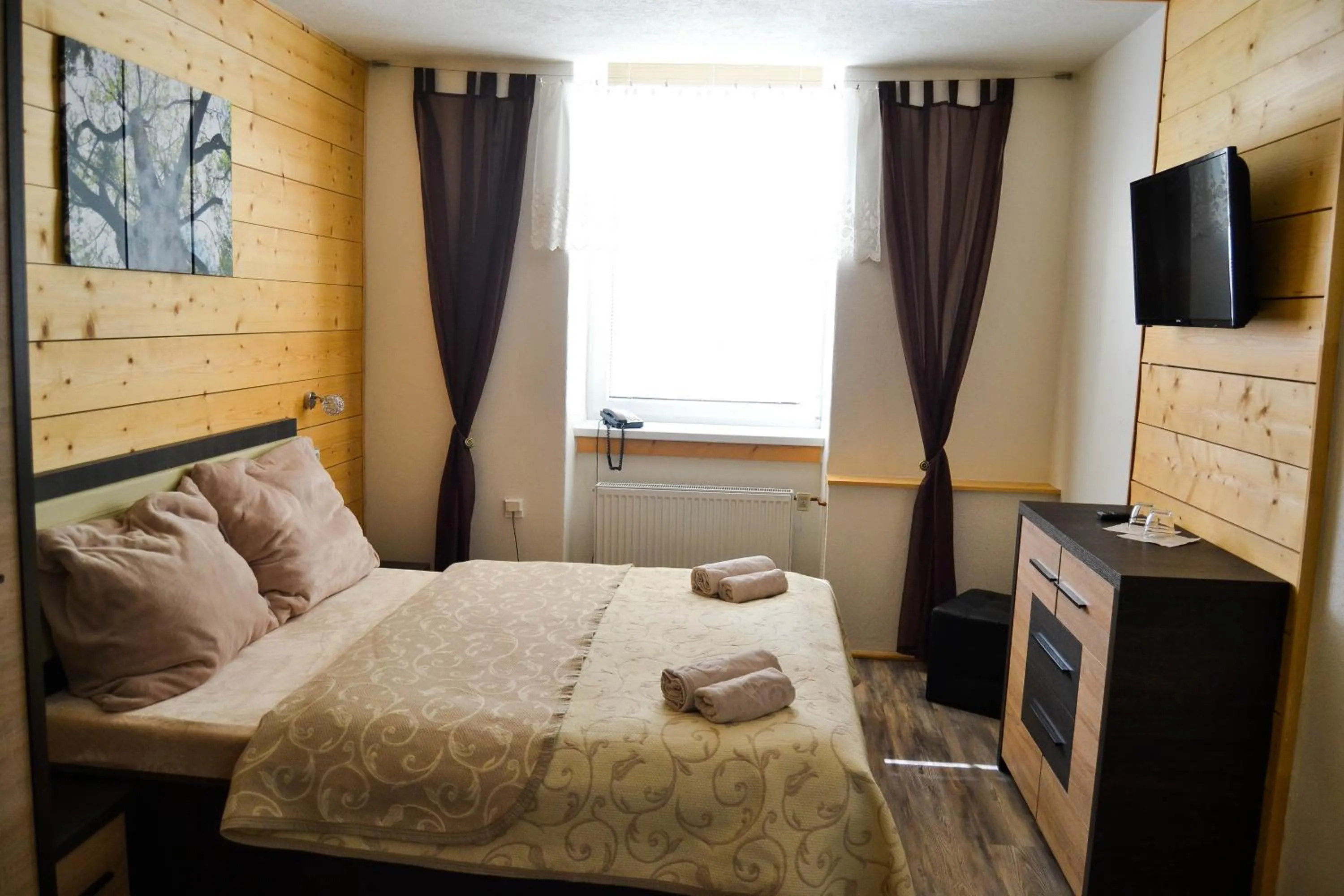 Seating area, Bed in Hotel Krakonos