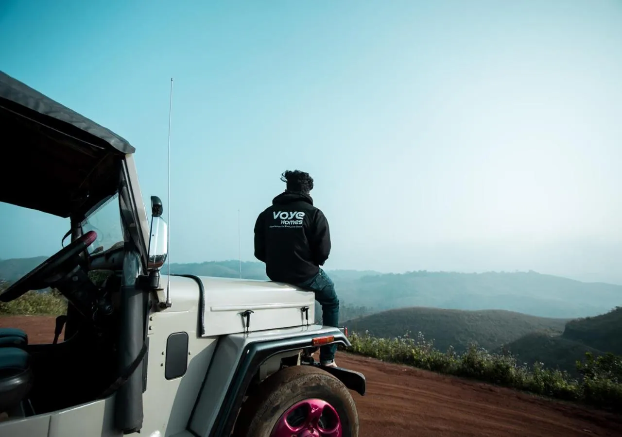 People in White Stone Vagamon Hilltop Cottage by VOYE HOMES