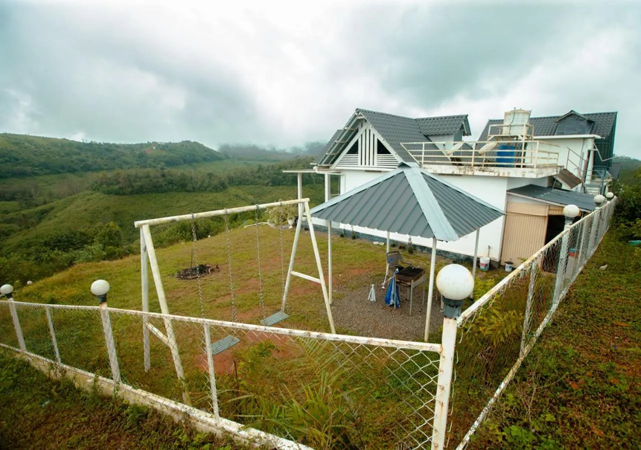 Property building in White Stone Vagamon Hilltop Cottage by VOYE HOMES
