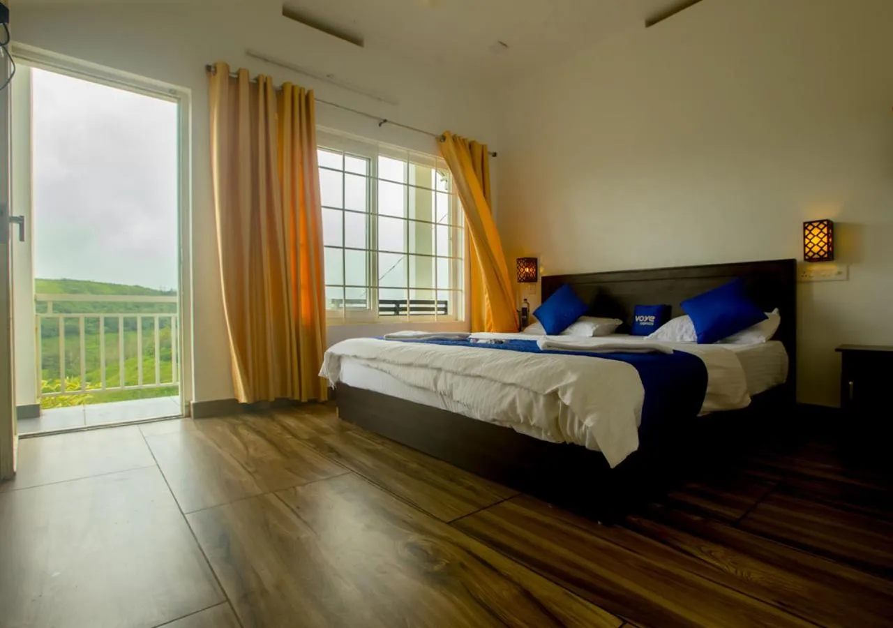 Bed in White Stone Vagamon Hilltop Cottage by VOYE HOMES