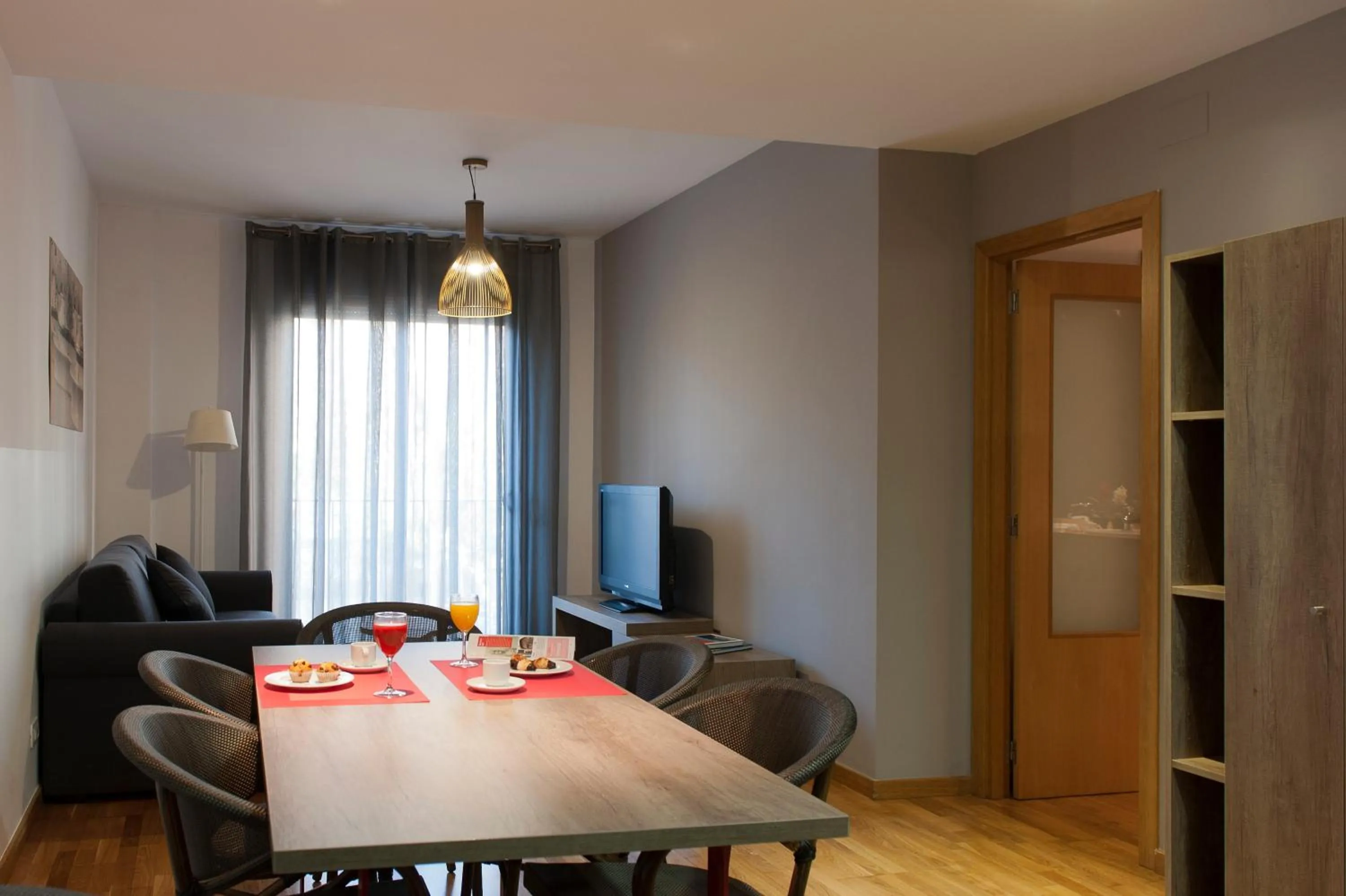 Dining area in MH Apartments Gracia